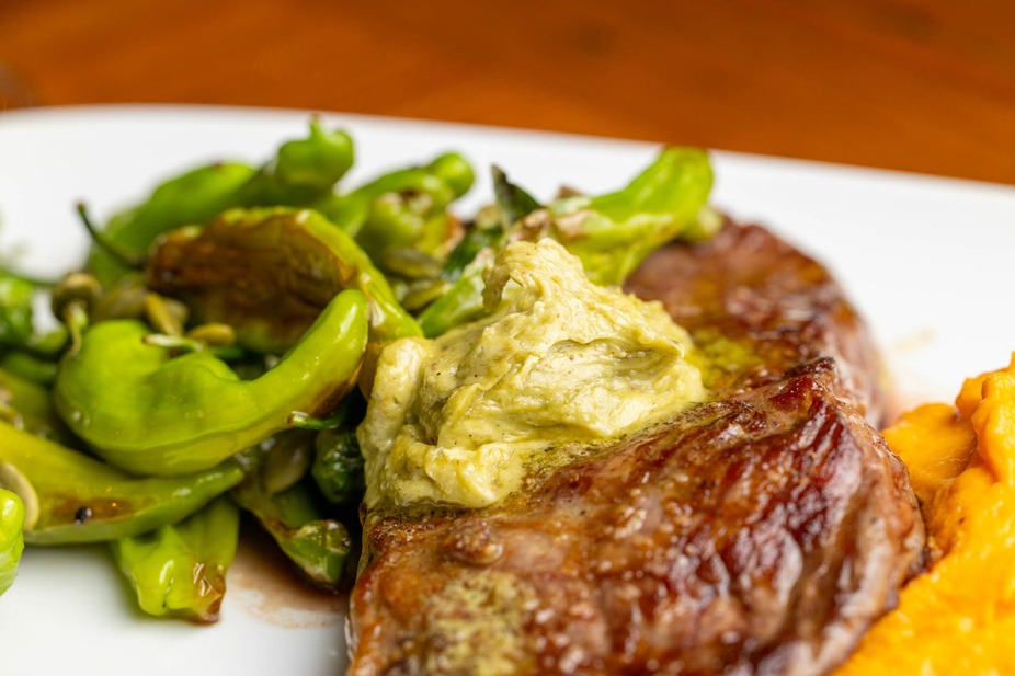 EdgeWild - Enjoy a perfectly grilled steak topped with creamy butter ...