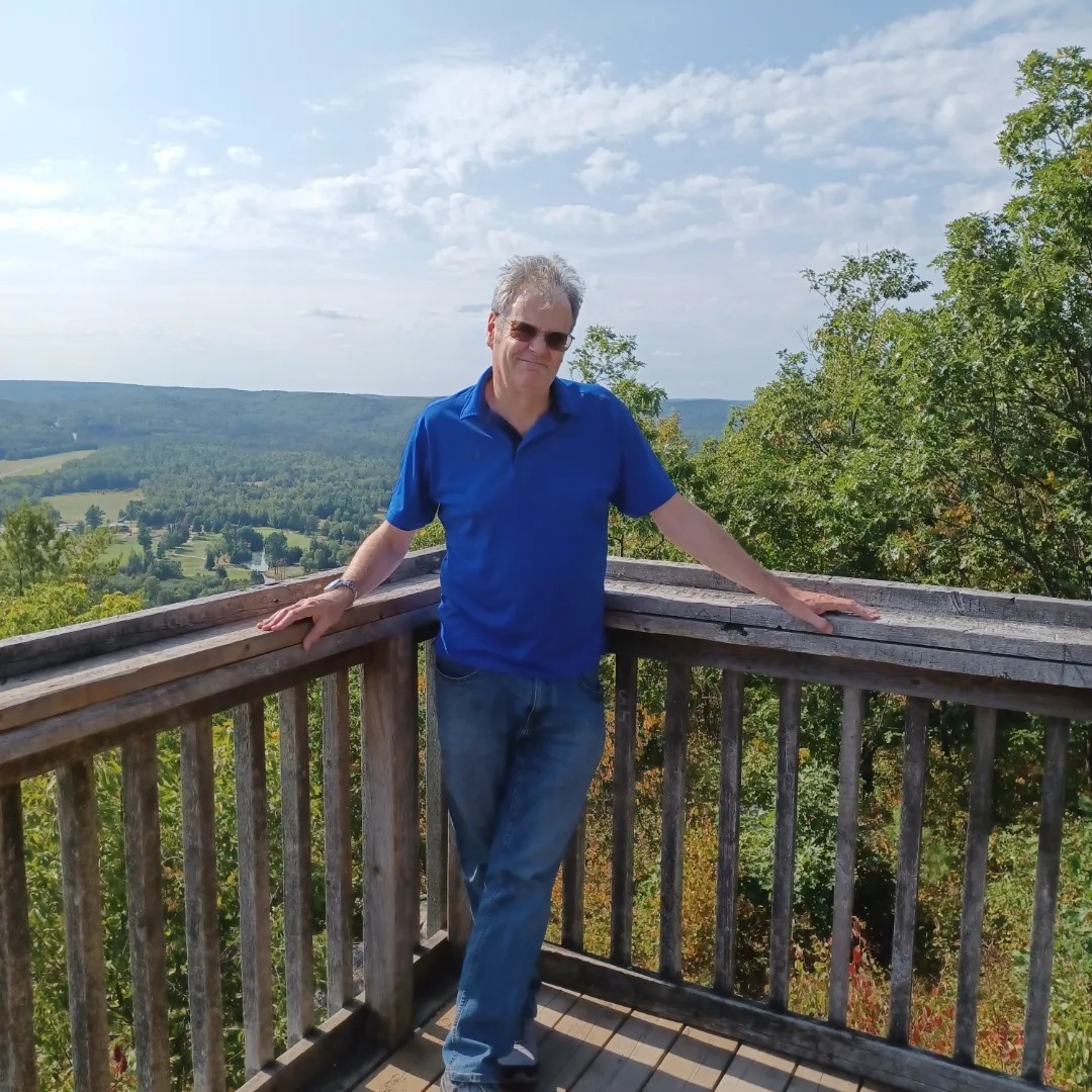 Mike Rutherford speaks on the message of 