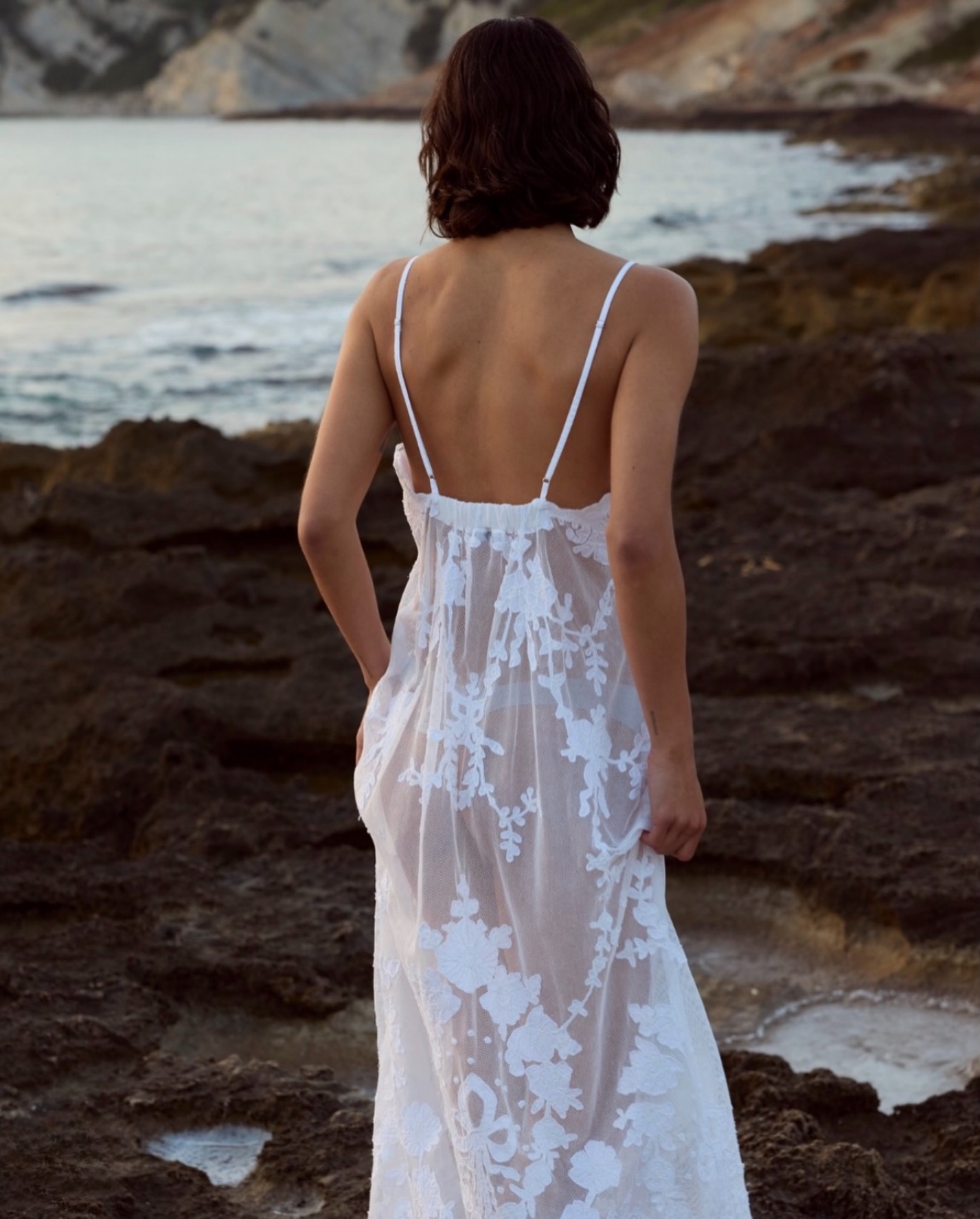 juliet dunn beach dress Sheer elegance by the sea 🤍 The Embroidered Net Maxi by is the ultimate statement in effortless glamour Jovani 42800 Long PROM Color:Pic Royal Blue Juliet Dunn white V Neckline:Asymmetrical