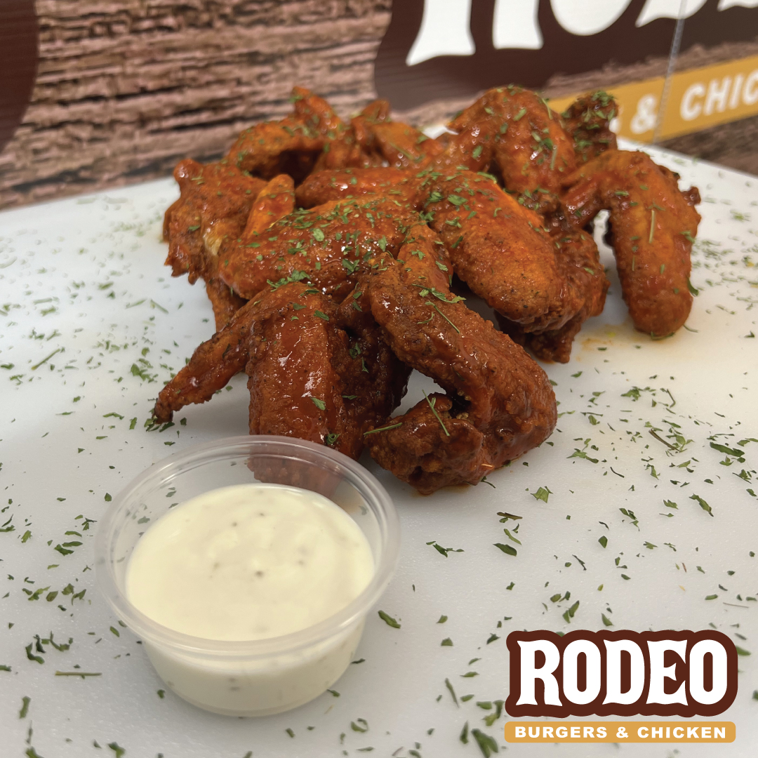 Our bone-in wings will make... - Rodeo Burgers and Chicken
