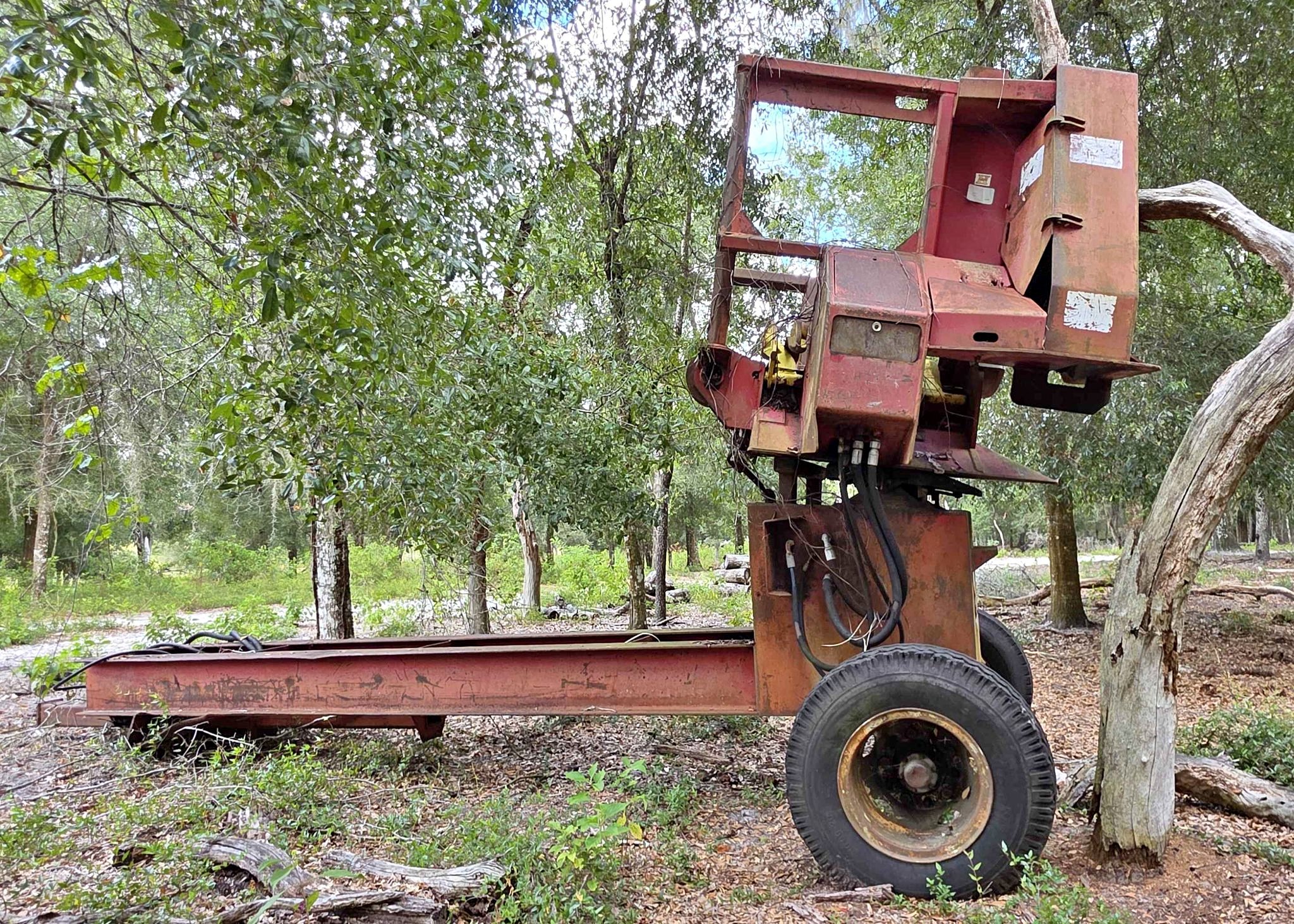 1982 Logging pull through delimber tree logging log delimber ...