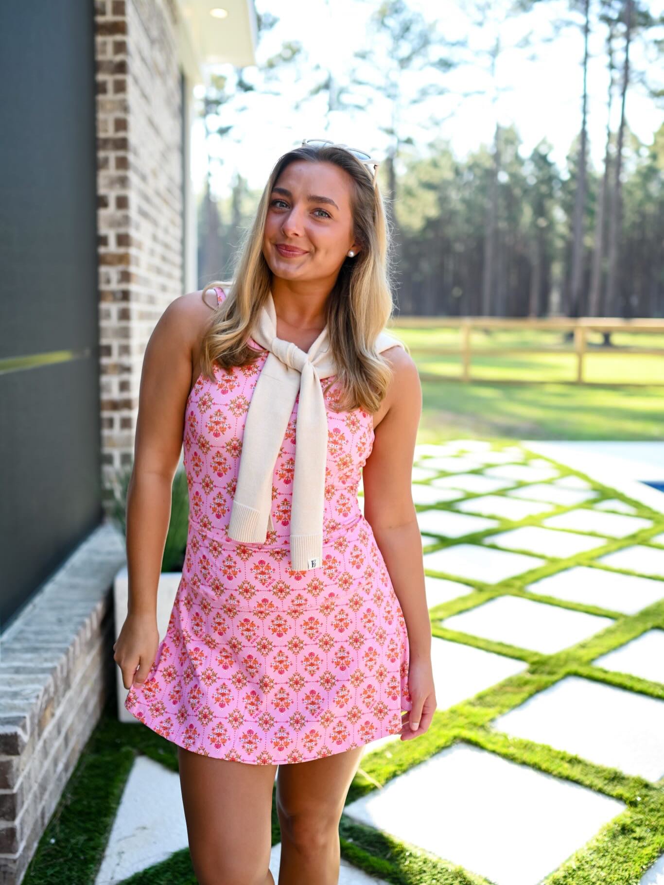 pink and green athletic dress The new London Floral is the perfect casual outfit! It comes in too with the cutest scallop detail on the back! Throw a cardigan over it or fitted dress