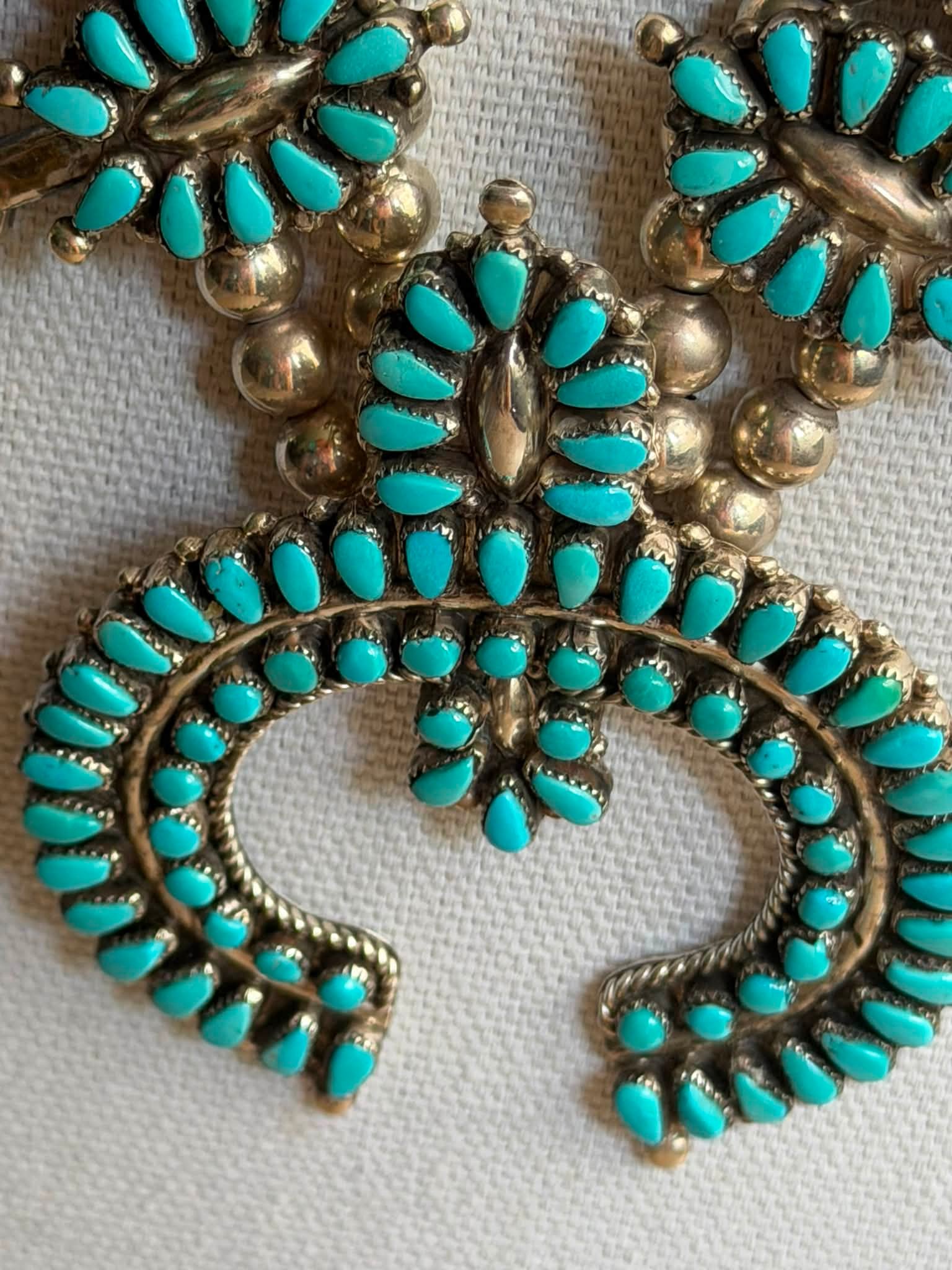 Turquoise Zuni squash blossom necklace by Mary Ann & Felix Chavez