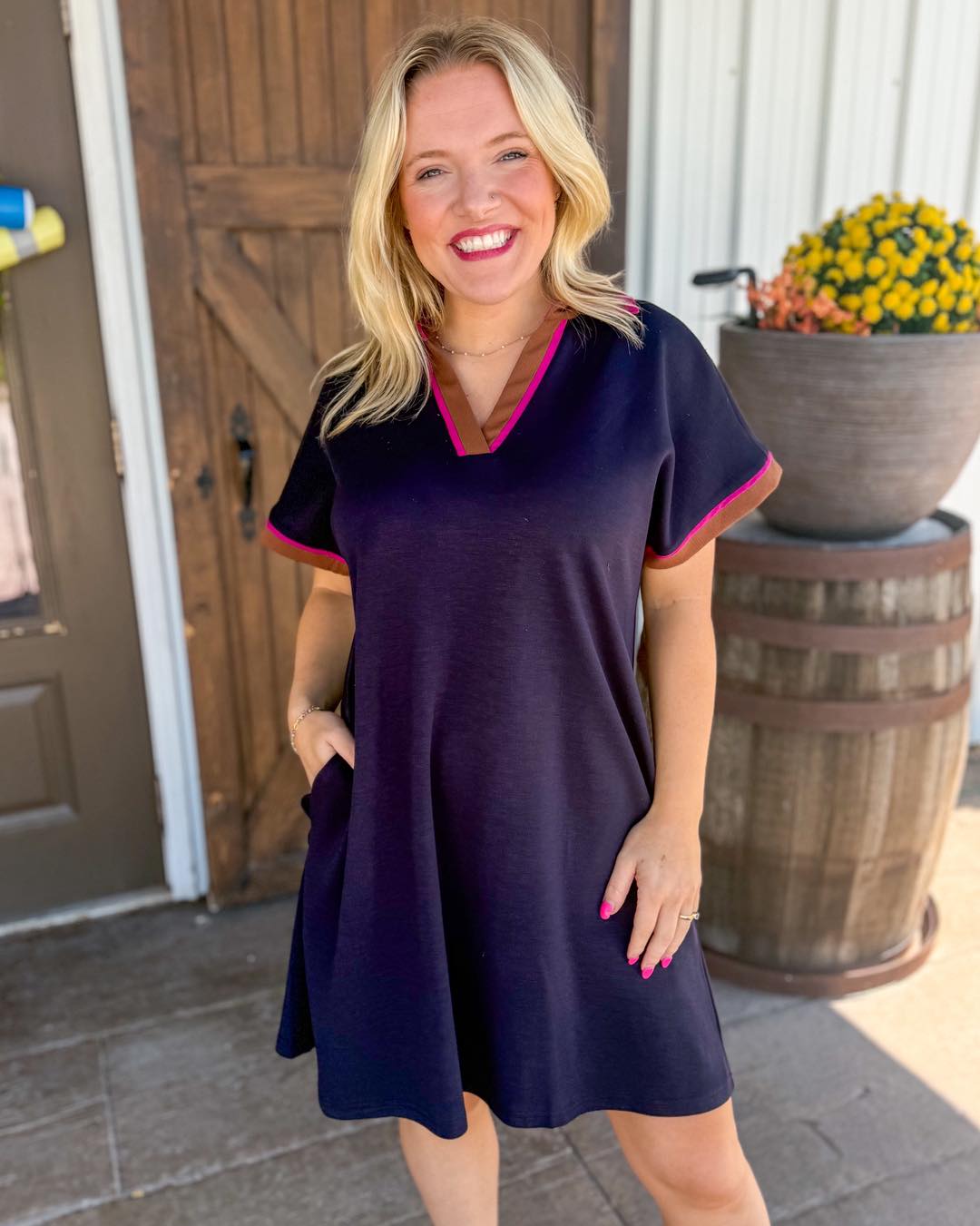 Easy throw-on navy dress with hot pink and camel accents