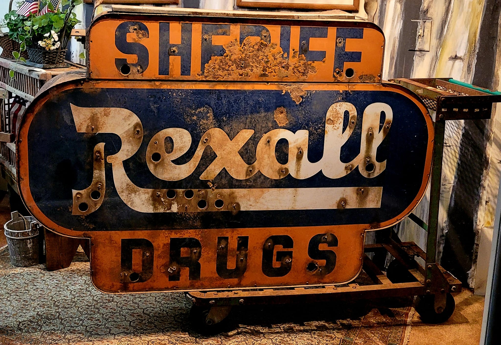 What does the original Sepull Rexall Drugs sign look like in