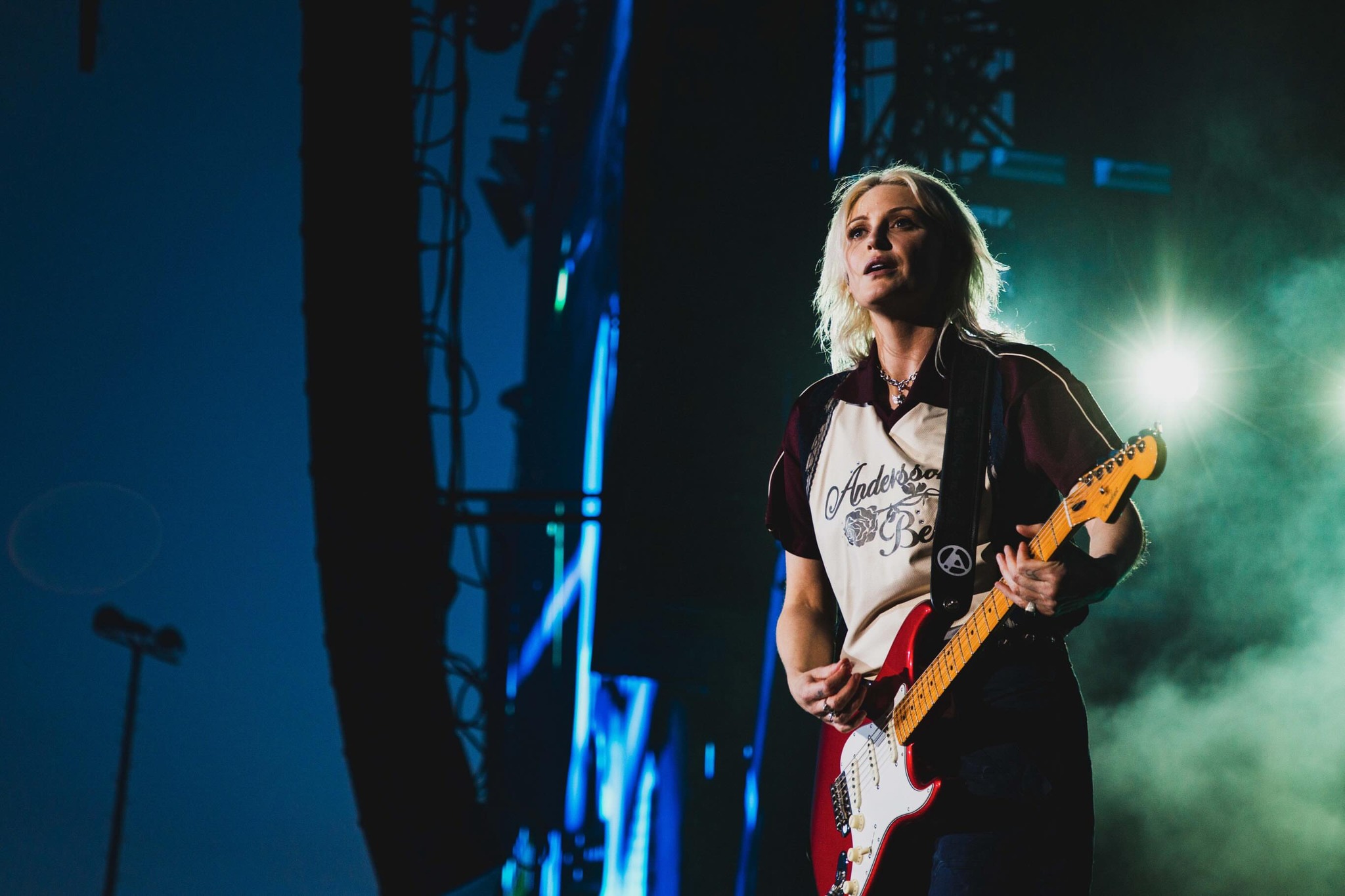 Emily plays guitar at The Lyon Show