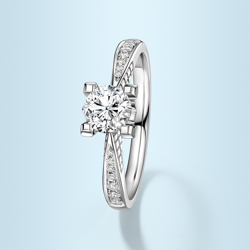 Darry - A Dazzling diamond is set at the top of the ring with diamonds ...