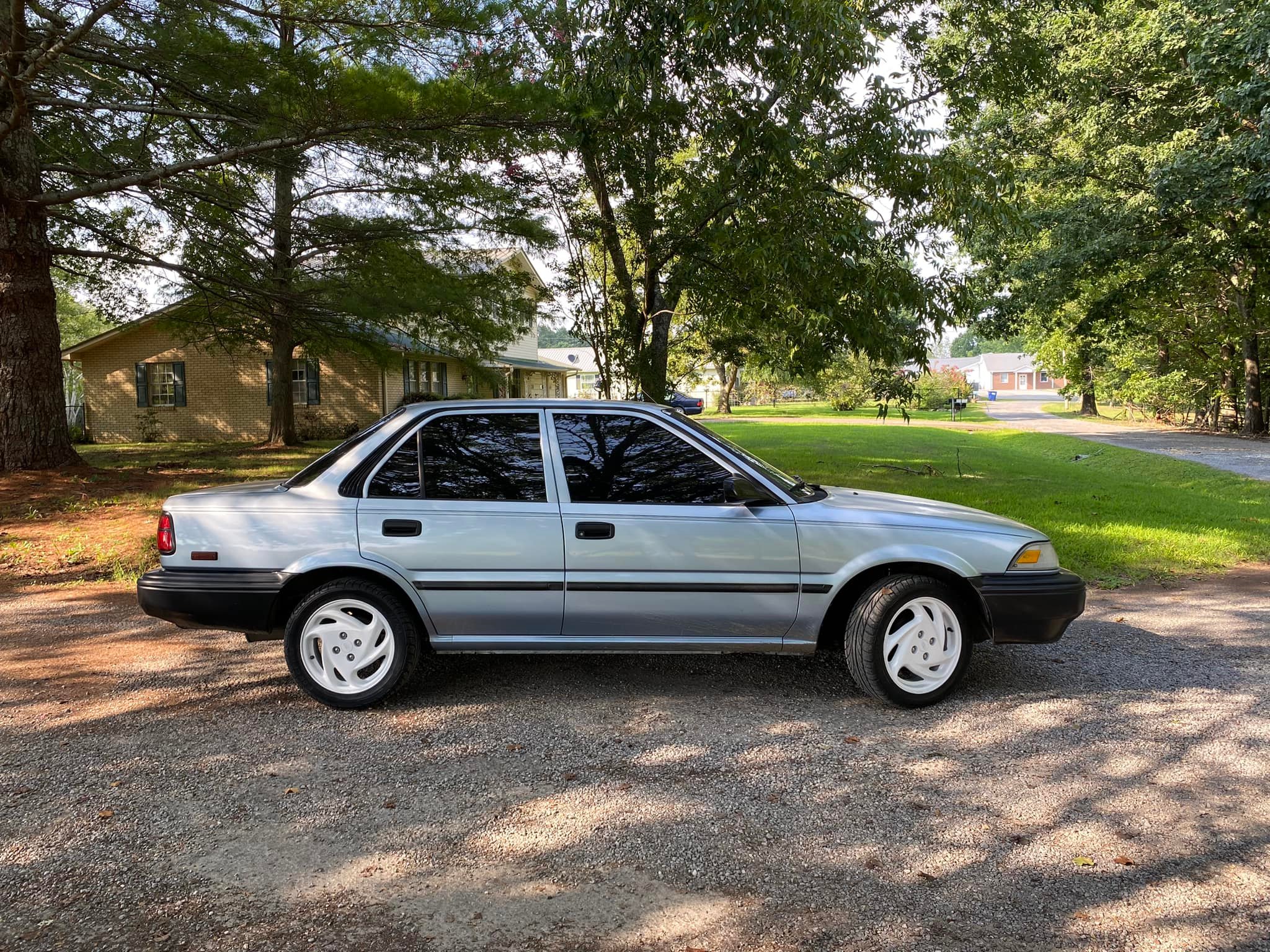 My AE92 Corolla daily on Escort ZX2 wheels.