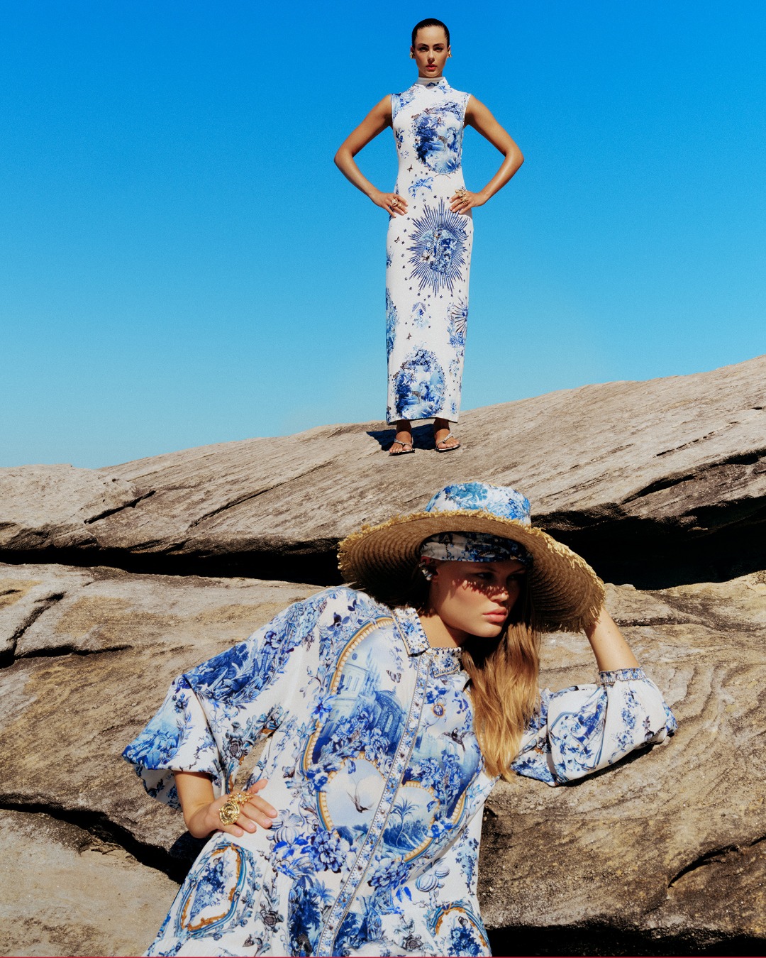 Camilla porcelain print dress on coastal rocks