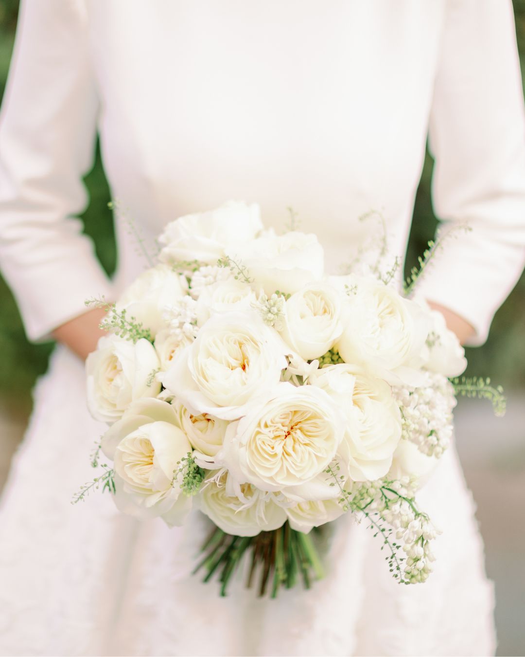 flowers for ivory wedding dress The most refined palettes this season are built within a single tonal range: on ivory, cream on cream, where depth of a composition comes entirely from form and texture. Leonora's NA-08.05.25AM
