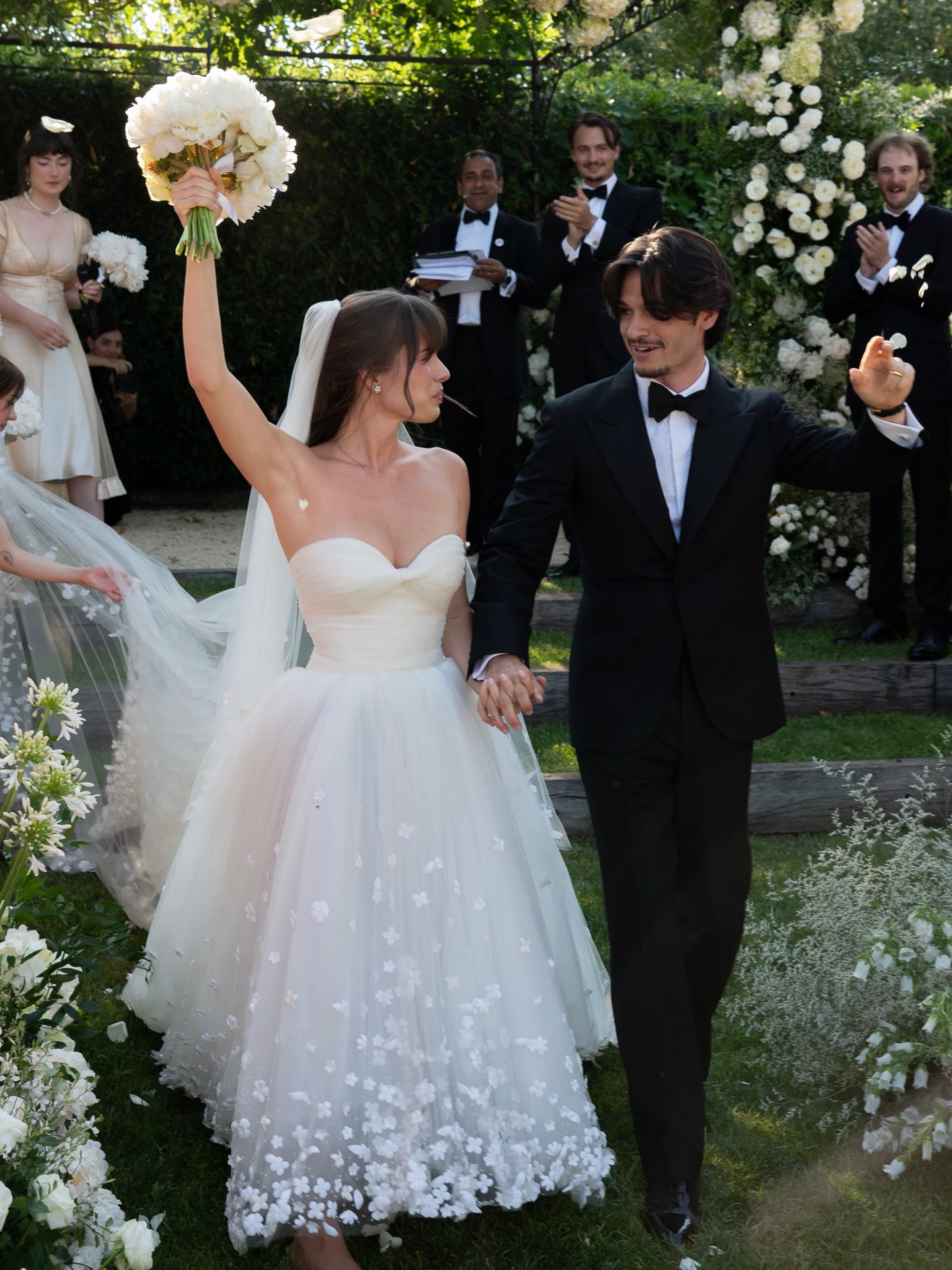 The bride wore Oscar de la Renta. For her wildflower garden