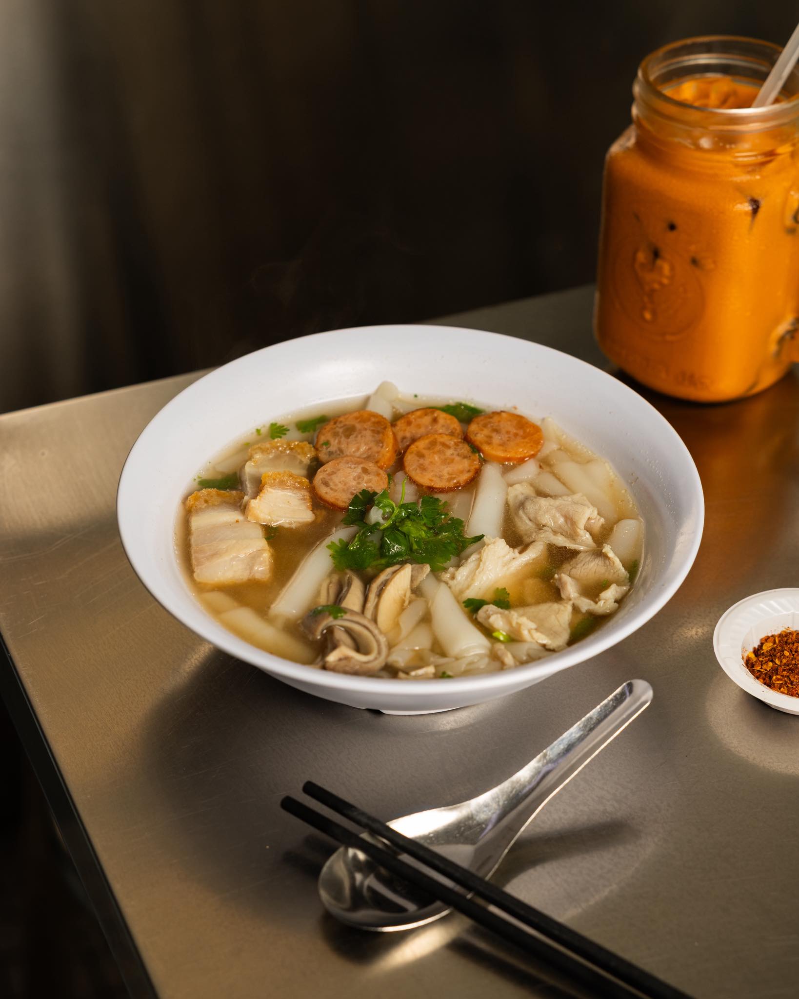 Yaowarat - A warm bowl of Thai kway chap, slow-boiled meats, silky rice ...