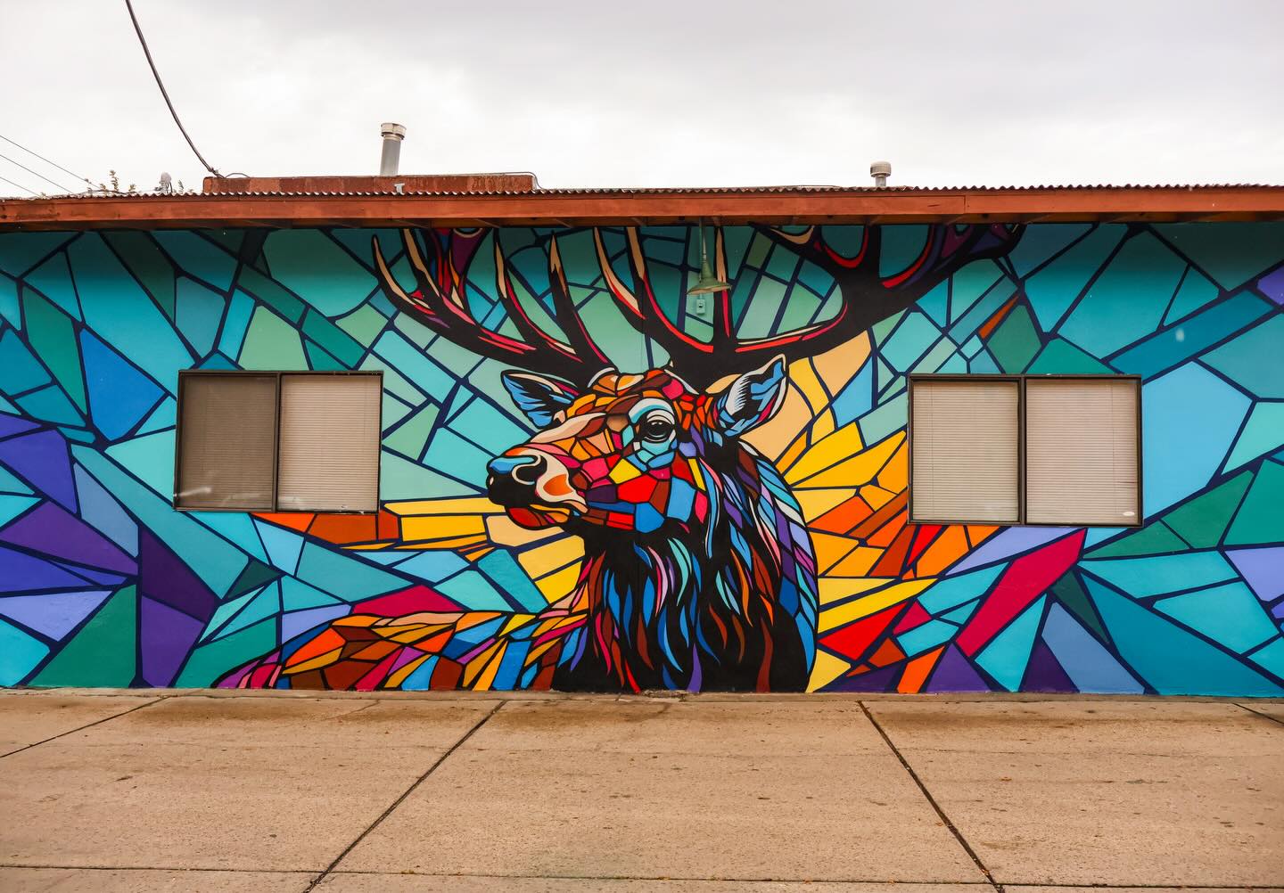 Vibrant prism elk mural in downtown Flagstaff