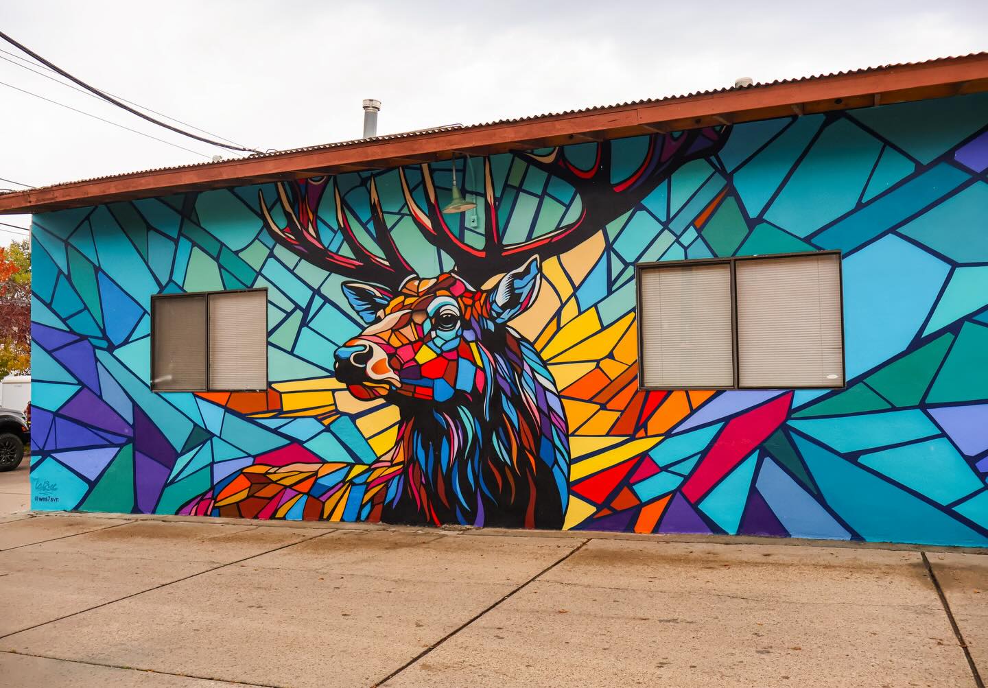 Vibrant prism elk mural in downtown Flagstaff