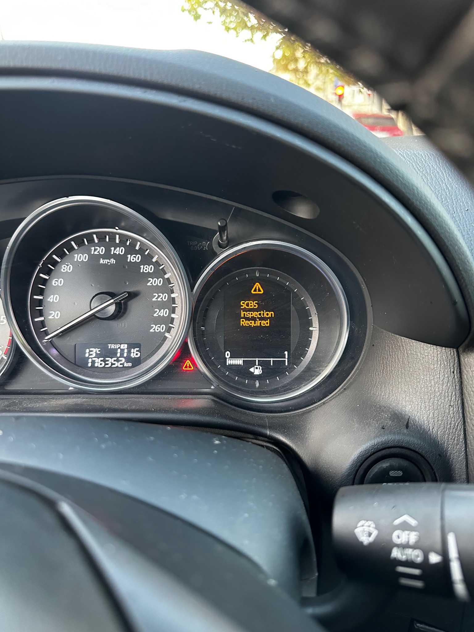 Why is the SCBS inspection light on in my 2013 Mazda CX-5 after