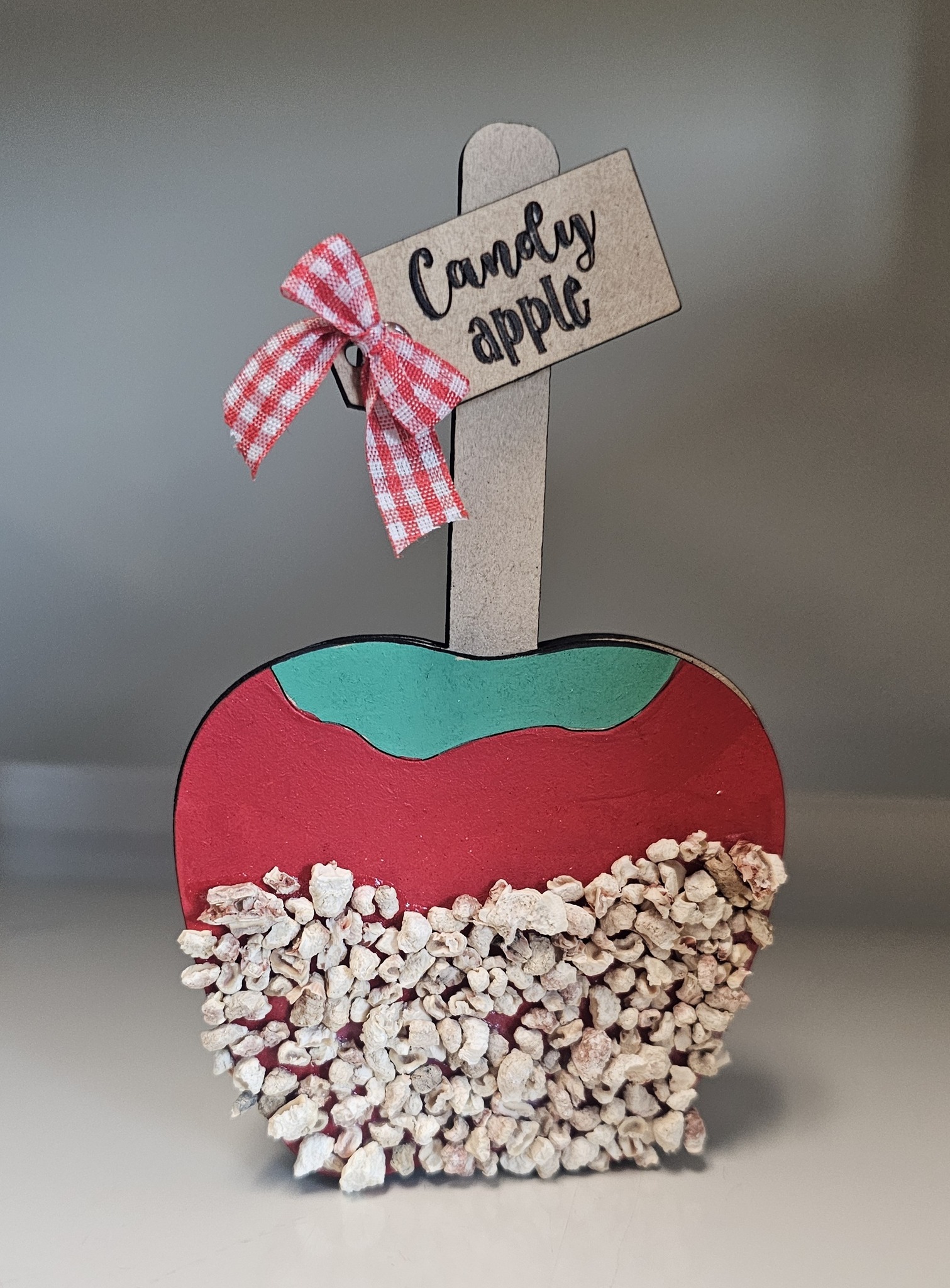 Candy apple shelf sitters made at Vinton library