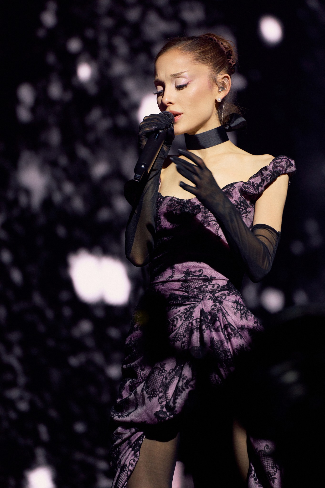 ariana grande lipsy black dress wears a custom Vivienne Westwood draped corseted in purple chiffon with lace overlay for her first show of The Eternal Sunshine Tour in Oakland, California. Styling: Law Roach SIZE - True to U.S. Size (Regular Width):10.5 YGroup_15028194410861 Beyoncé Wears Black Dress