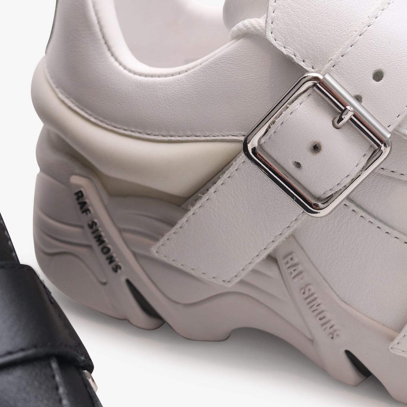The Raf Simons (Runner) Antei 22 sneakers feature a leather upper 