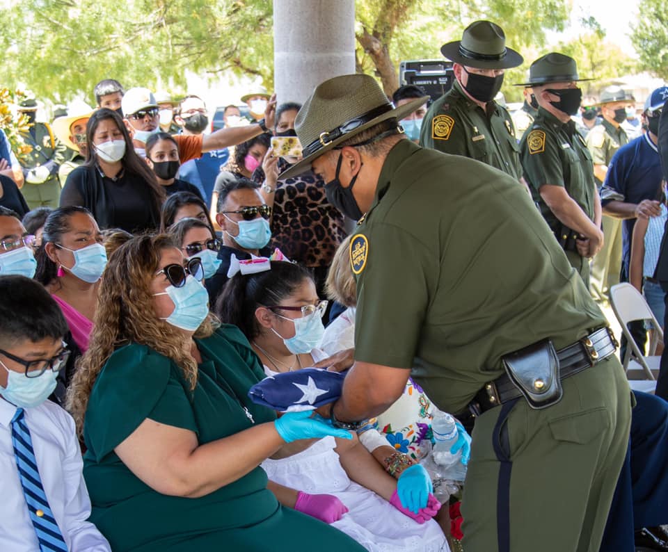 Presenting the US flag on behalf of... - US Border Patrol