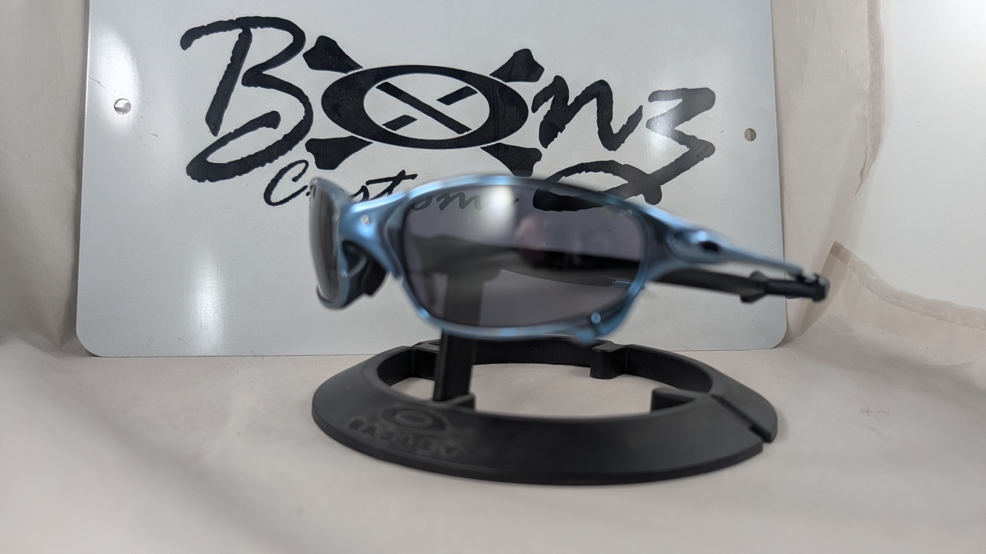 Anodized blue polished juliet oakley