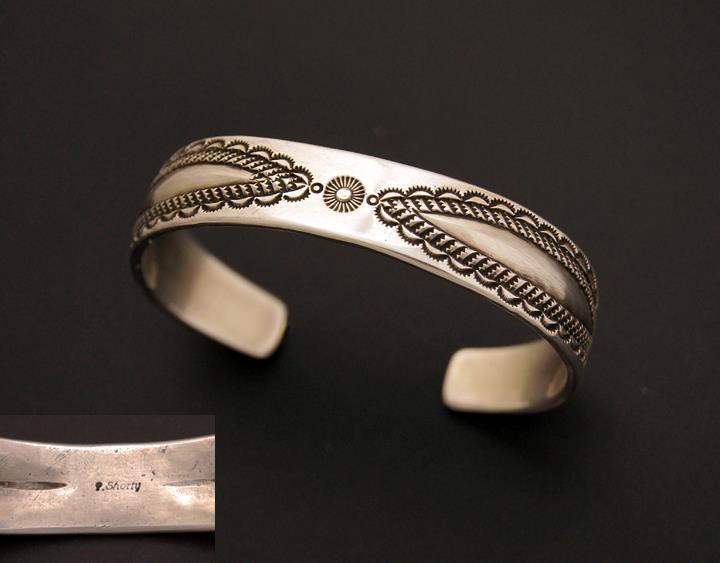 Navajo silversmith Herman Smith showing off his amazing style