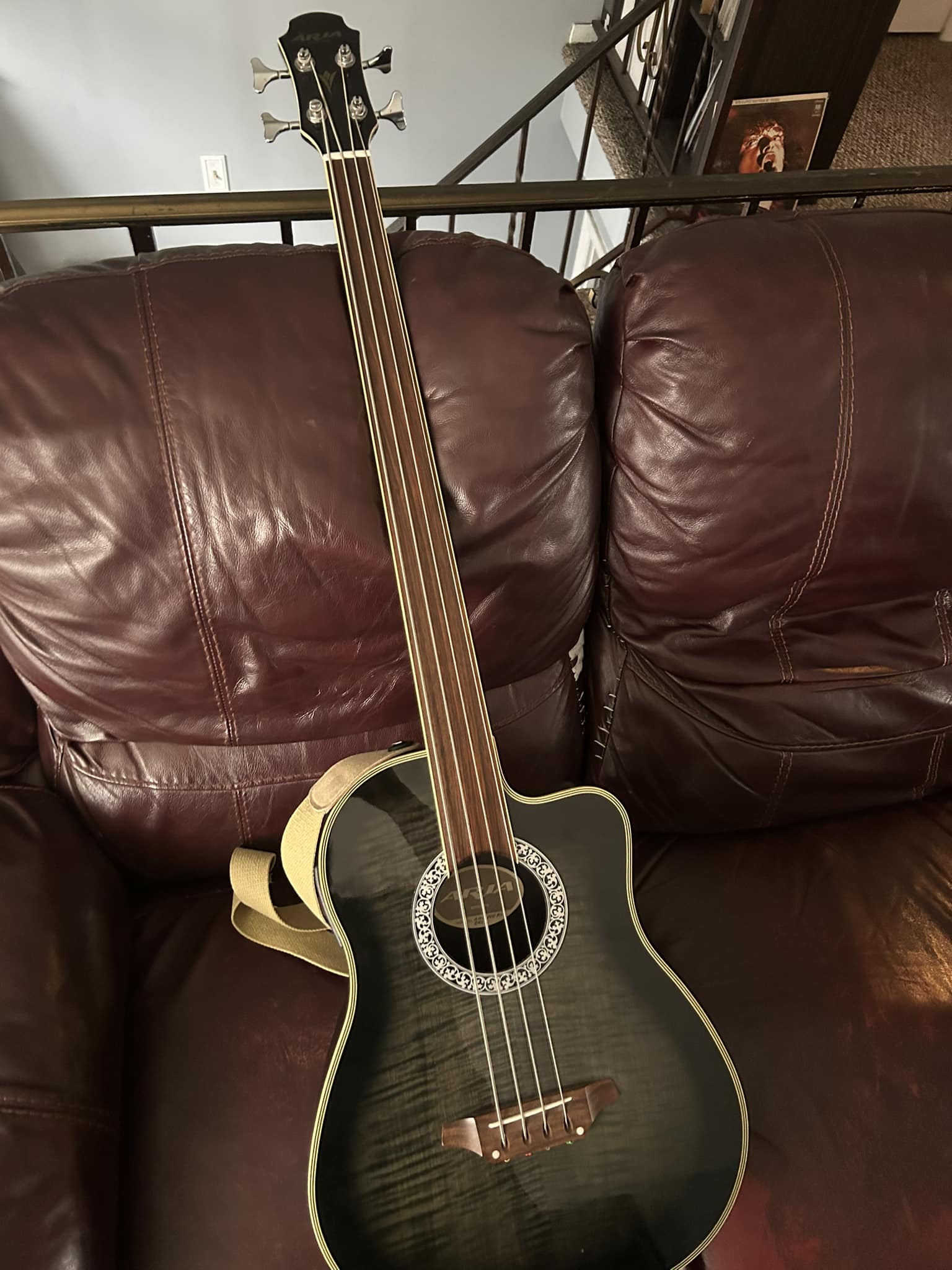 Should I keep my Aria AMB 50b/FL acoustic bass?