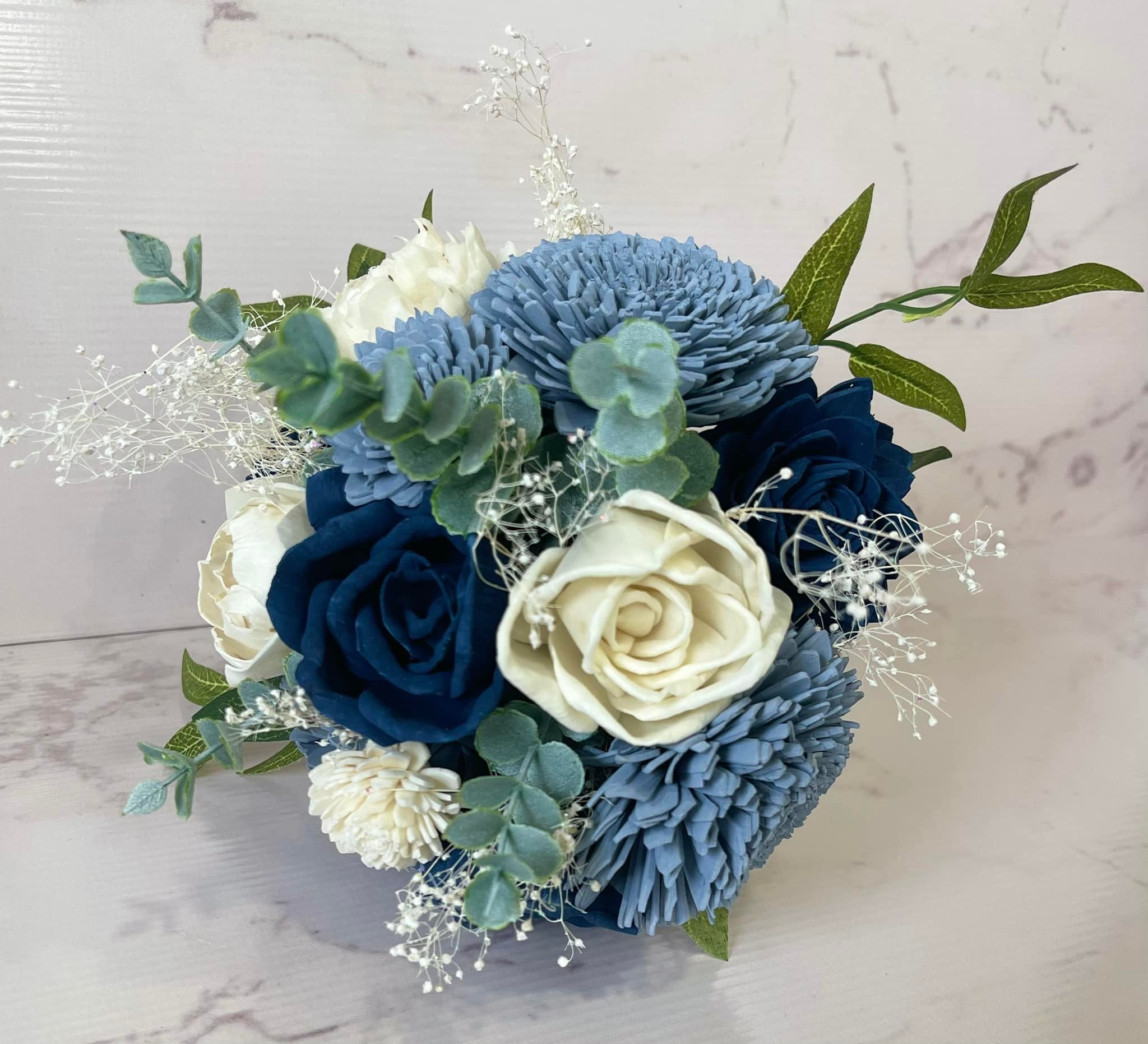 What flowers go well with a royal blue prom dress?