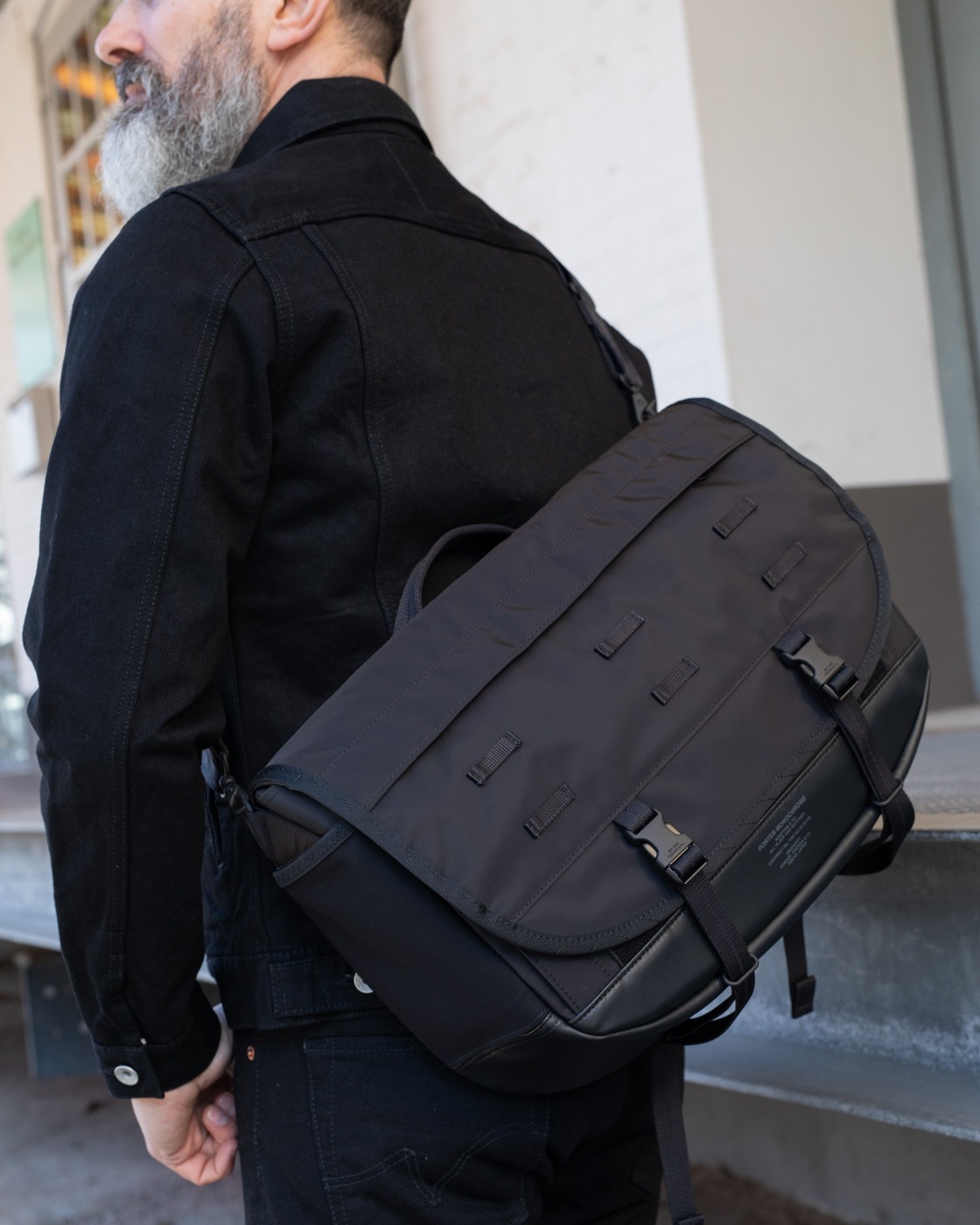 The Porter Yoshida & Co Monochrome Messenger Bag in black follows