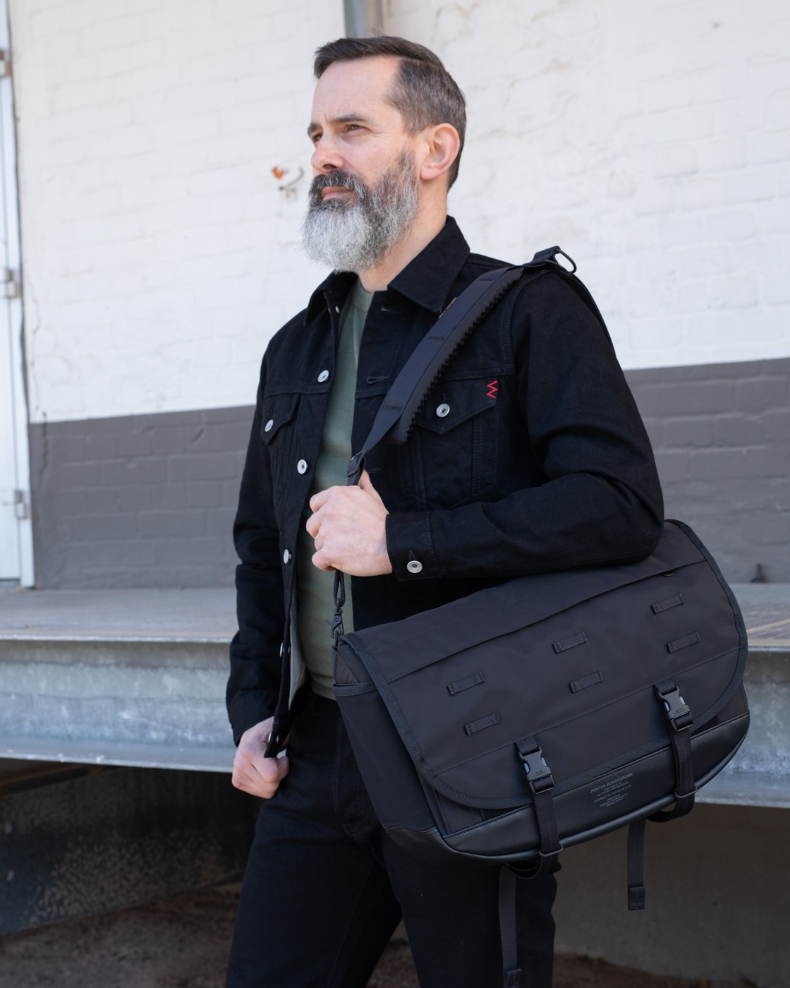 The Porter Yoshida & Co Monochrome Messenger Bag in black follows