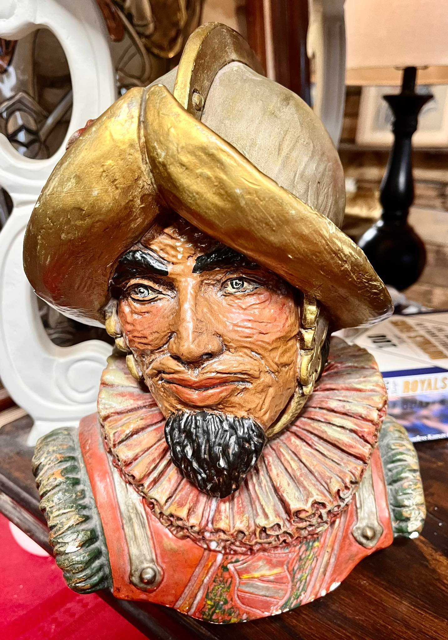 What is this vintage cast iron chalkware piece from Universal