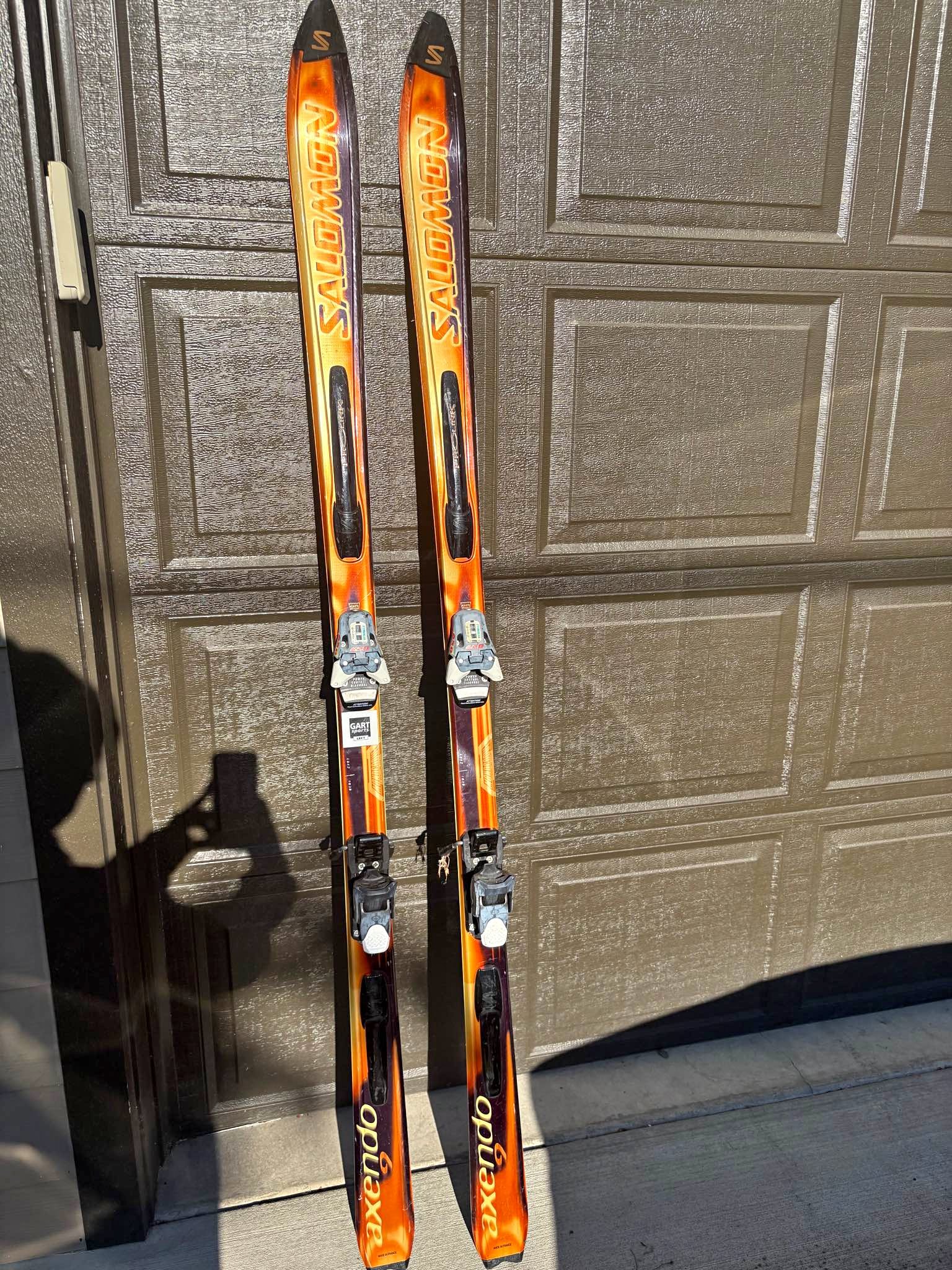 salomon axendo 6 skis S/MAX N6 XT  Women's (2026) 140 / M10 GW arcing carves on corduroy at speed as well Salomon Axendo 9 Skis WITH