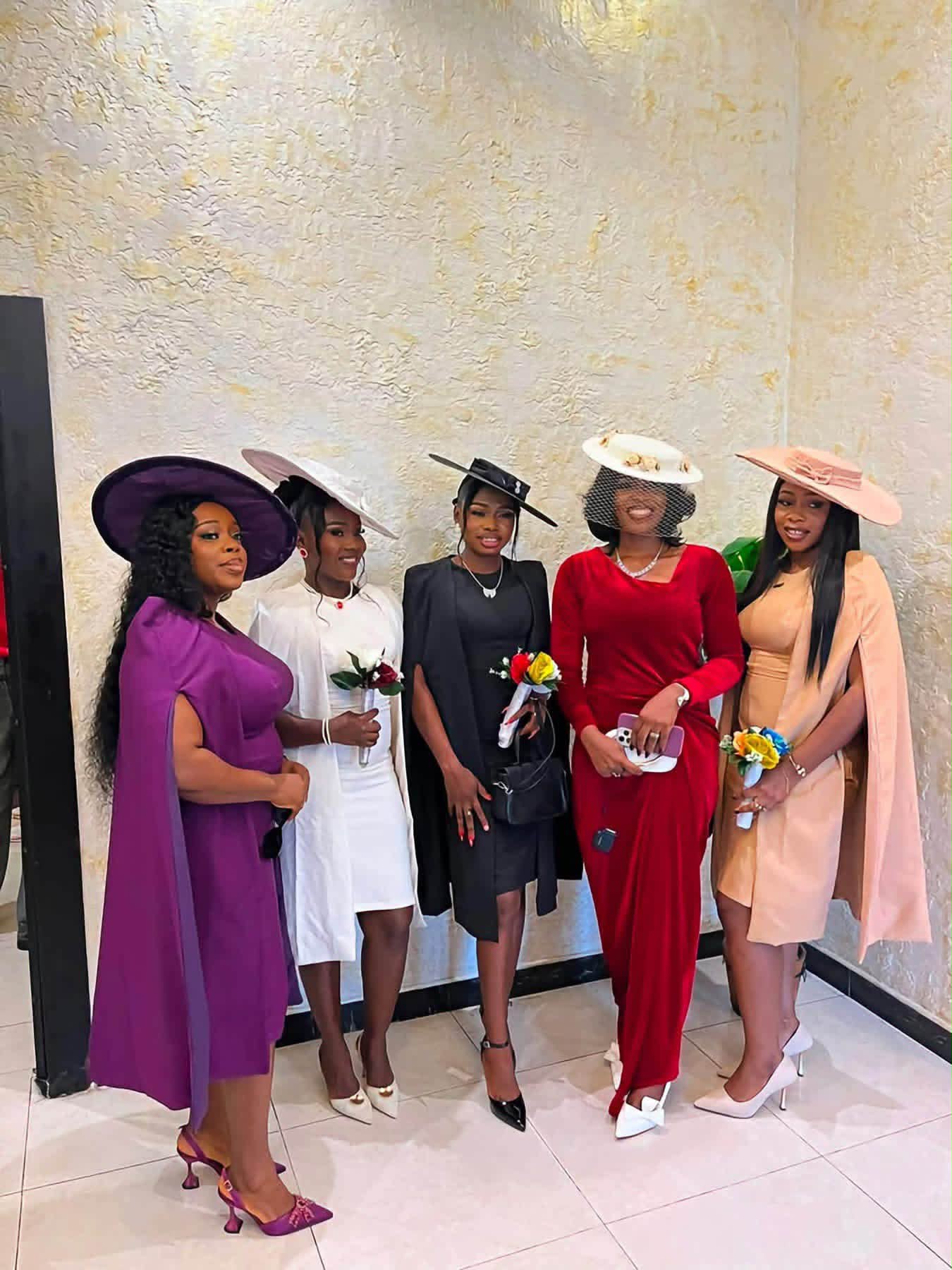 colourful bridesmaid dresses at Catholic Cathedral, Calabar wedding Color:Ivory/Light Blue Print UN-2023 Calvin Klein | Dresses