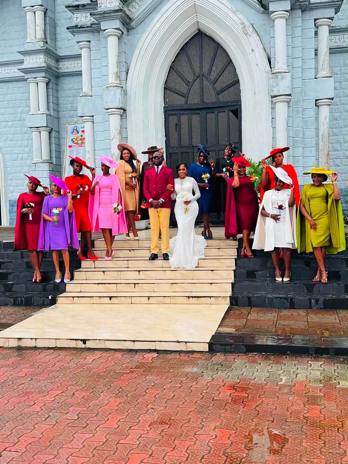 Colourful bridesmaid dresses at Catholic Cathedral, Calabar wedding
