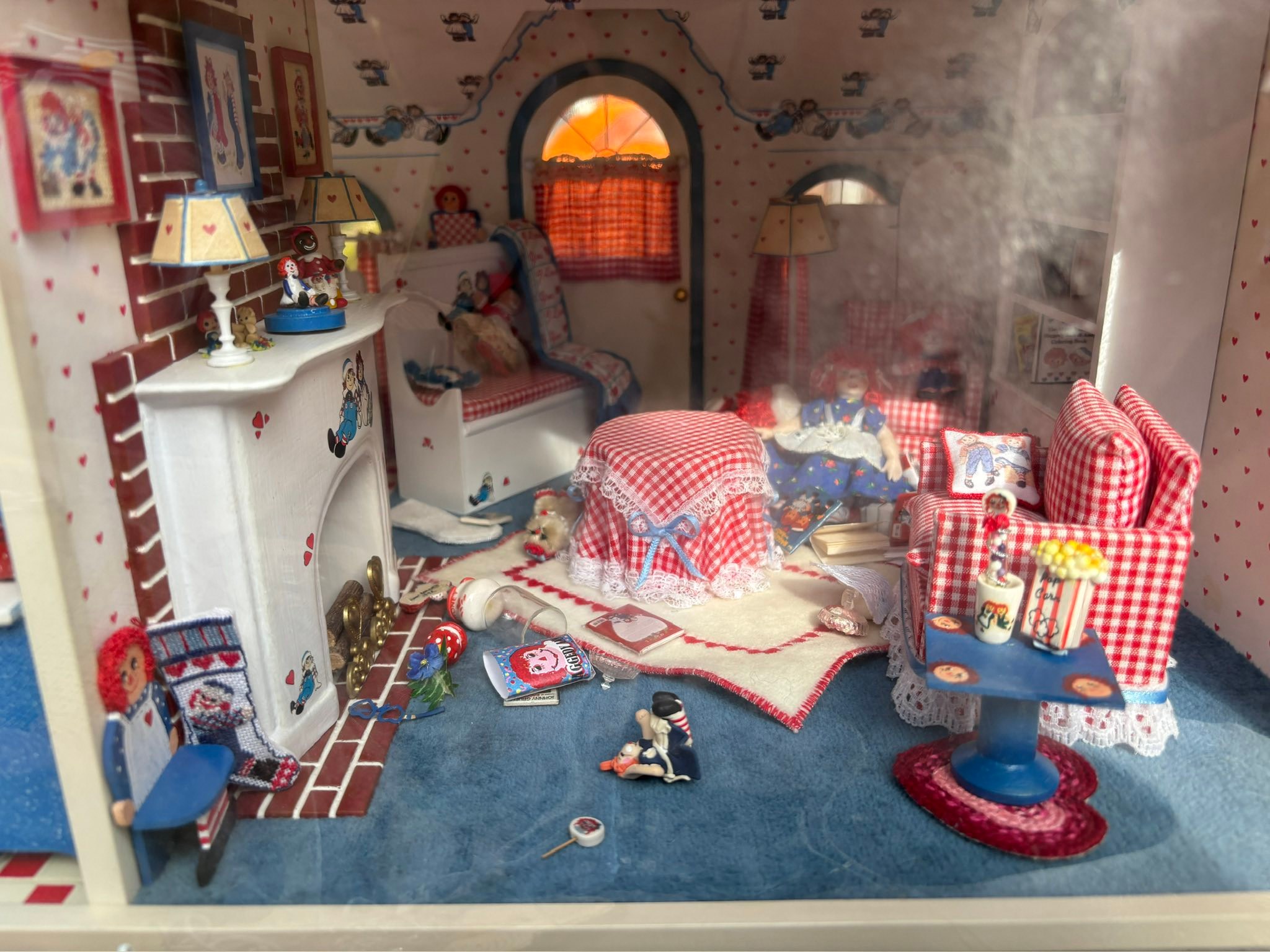 This dollhouse full of Raggedy Ann & Andy miniatures was at the