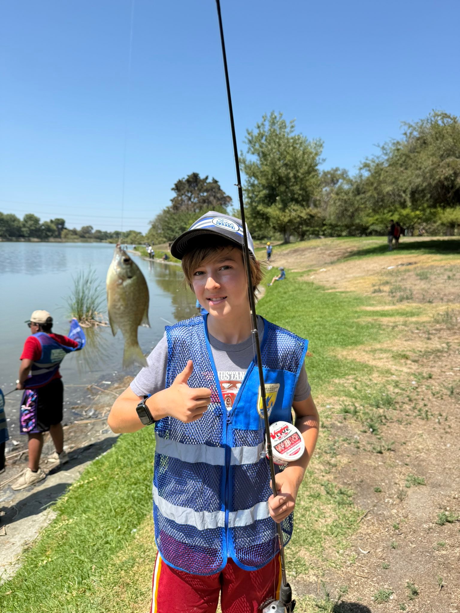 dan hernandez fishing pole White (Blue Logo) T-Shirt  Sport with Rods & Reels Day II