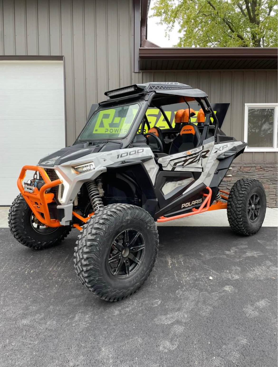 The ﻿﻿Polaris Sportsman XP 1000 High Lifter Edition ATV Conquers Mud