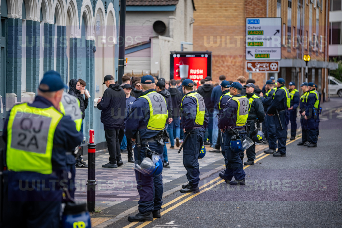Wiltshire - Riot police were on the streets of central Swindon ...