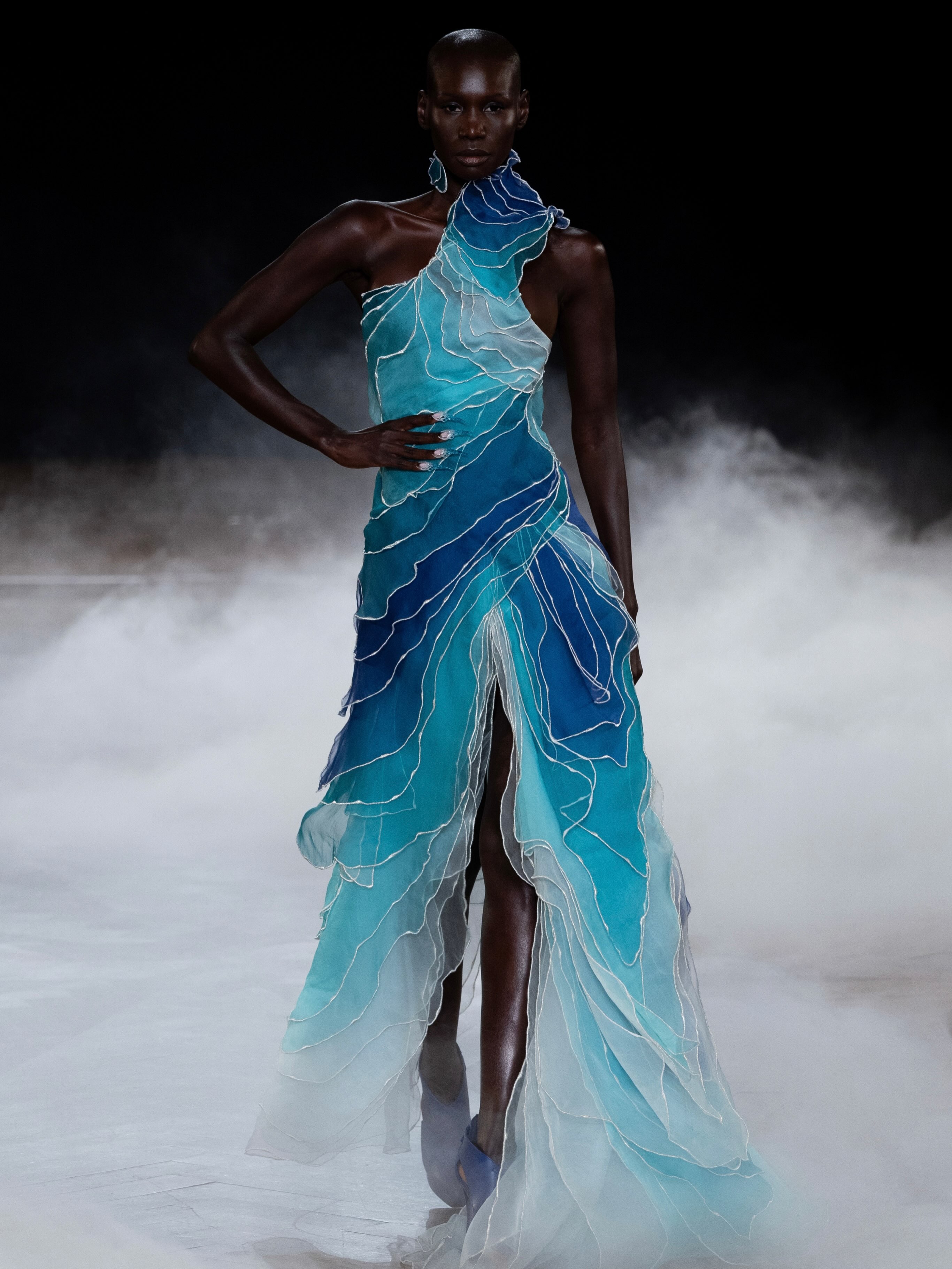 blue dress runway Ring Nebula gown ~ Inspired by Margaret Watts' voice figures, translucent layers of organza are dyed in gradients that shift from white into cobalt blue, while silver embroidery traces reverbera stopping look like the