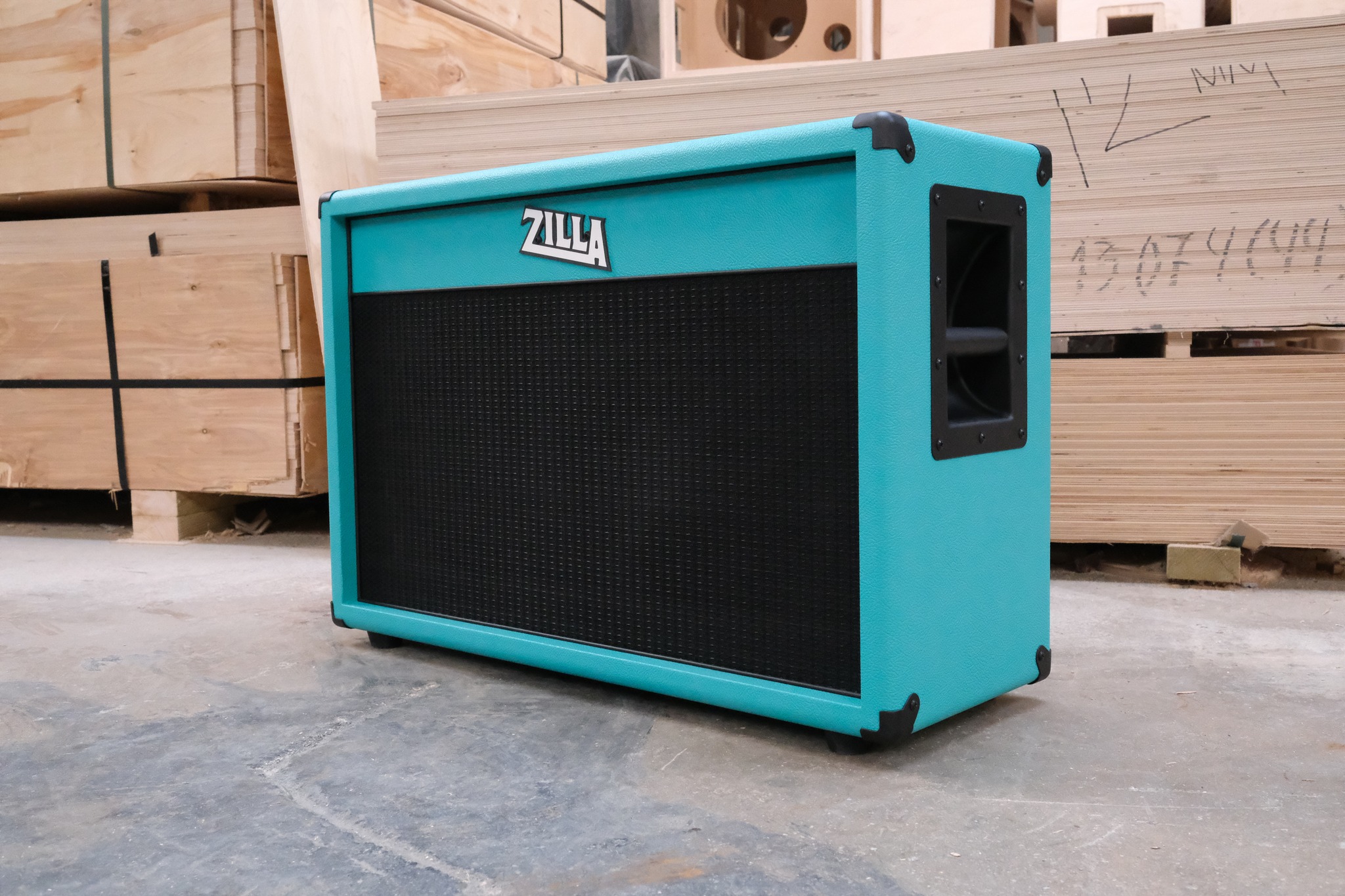 Zilla modern 2x12 speaker cabinet in teal finish