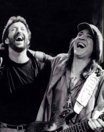 Eric Clapton and Stevie Ray Vaughan (hatless)