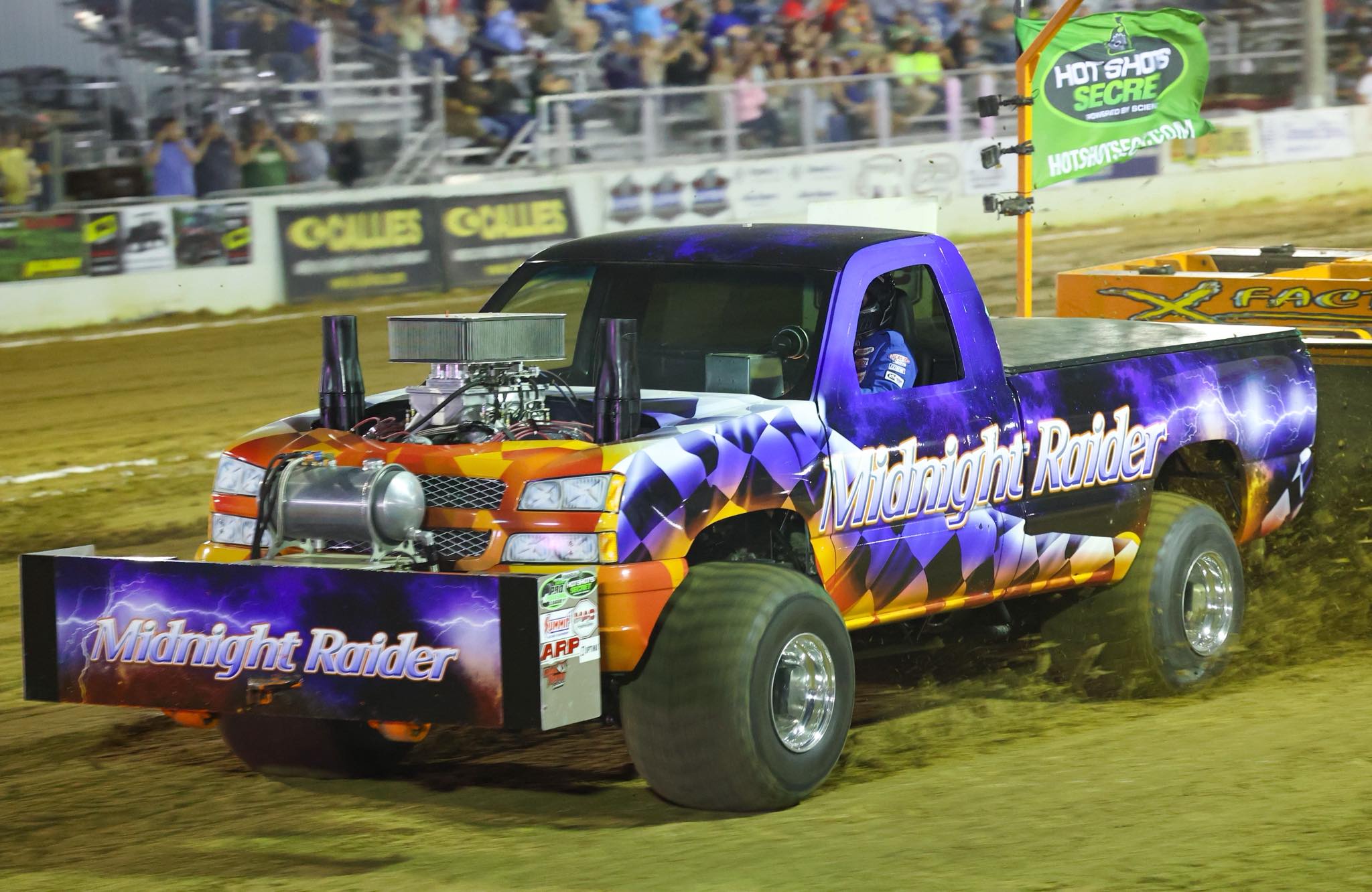Jim Bosch drives his “Midnight Raider” Modified 4x4 Truck to the
