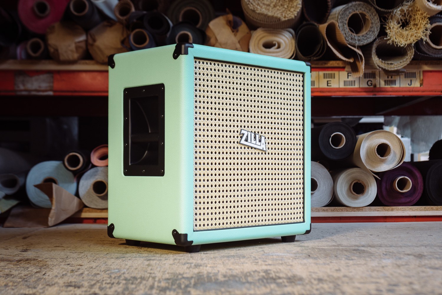 Zilla 1x12 guitar cab with wicker grille and sea foam green tolex