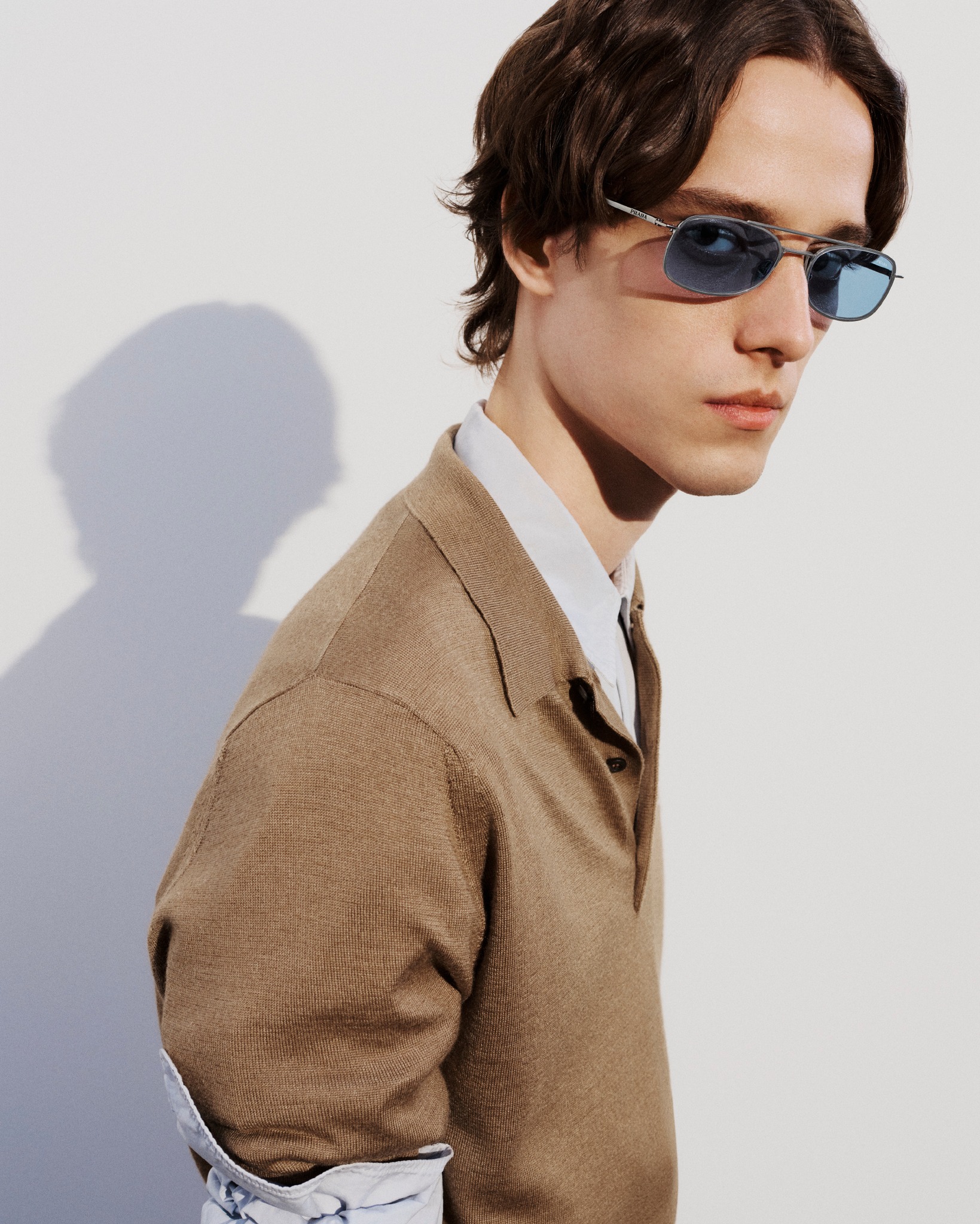 Prada Eyewear introduces minimalism in a lighter register, from