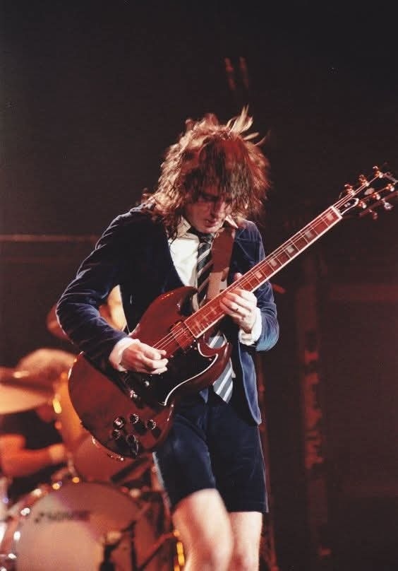Amanti - Angus Young's school uniform. He was 18 years old in 1973 when ...