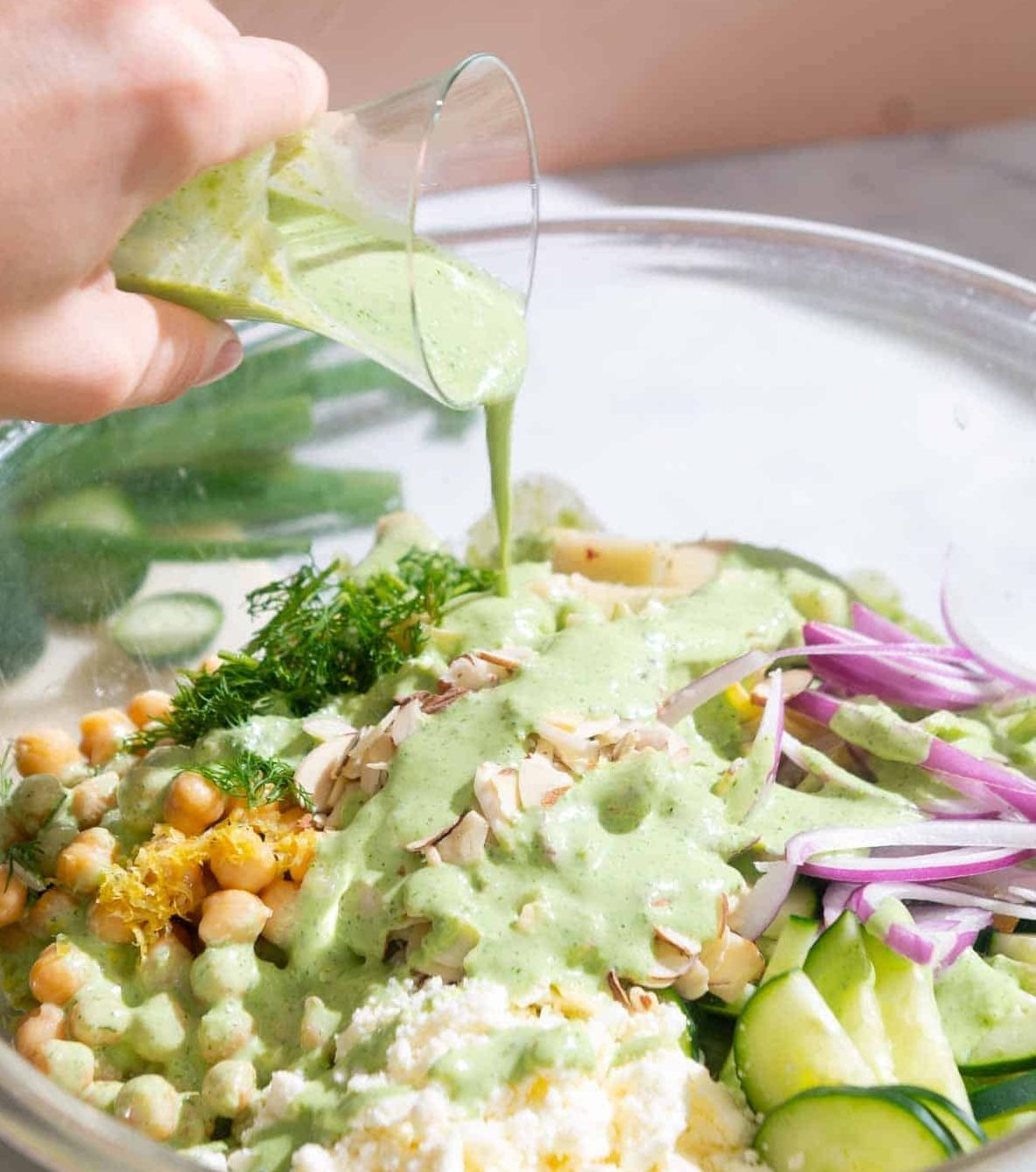 This is my Herby Greek Yogurt Dressing! Many salad dressings use sour cream or mayonnaise to add creaminess, but I wanted to develop a recipe that is a bit lighter. Greek yogurt