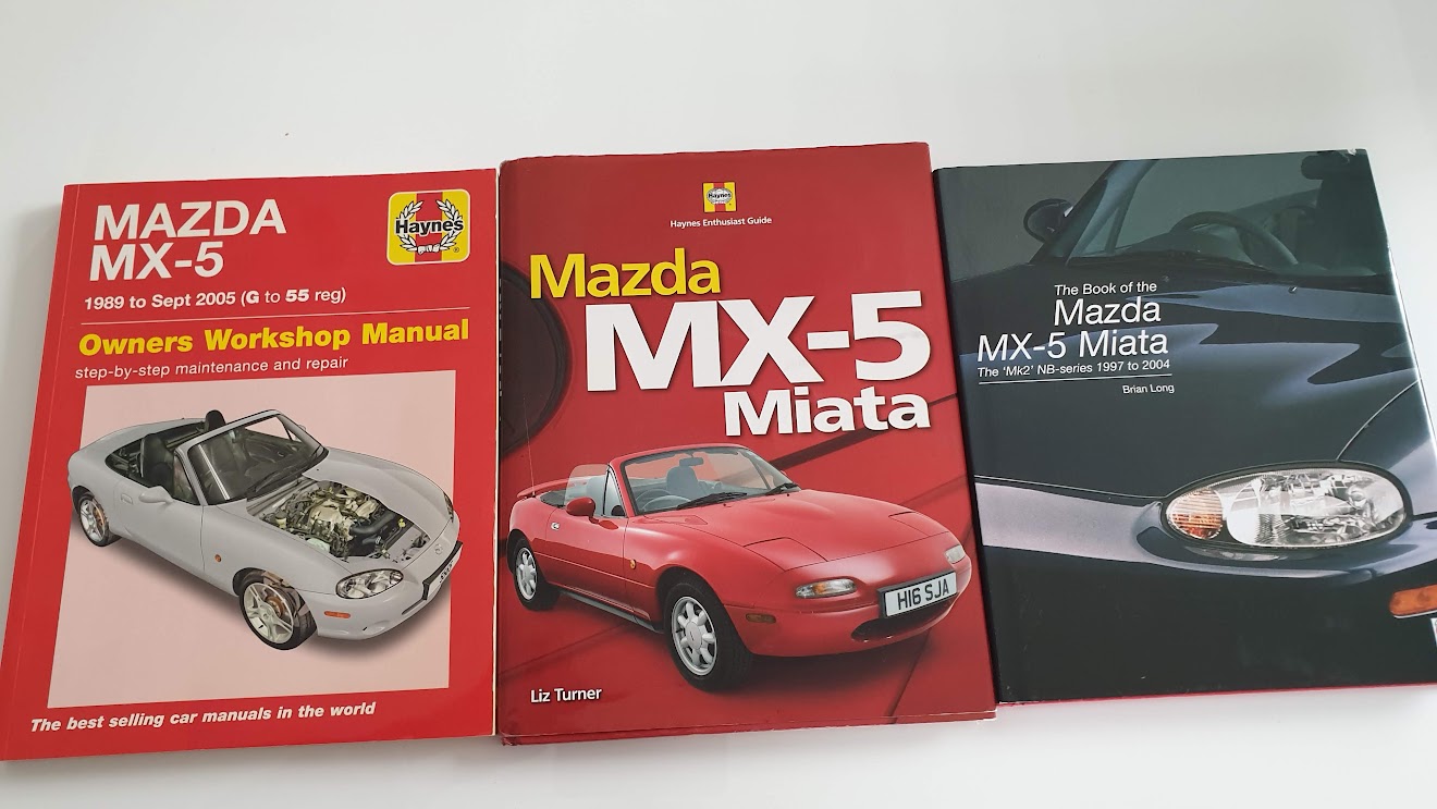 Mazda MX-5 books for sale: Haynes manual, Brian Long guide, and