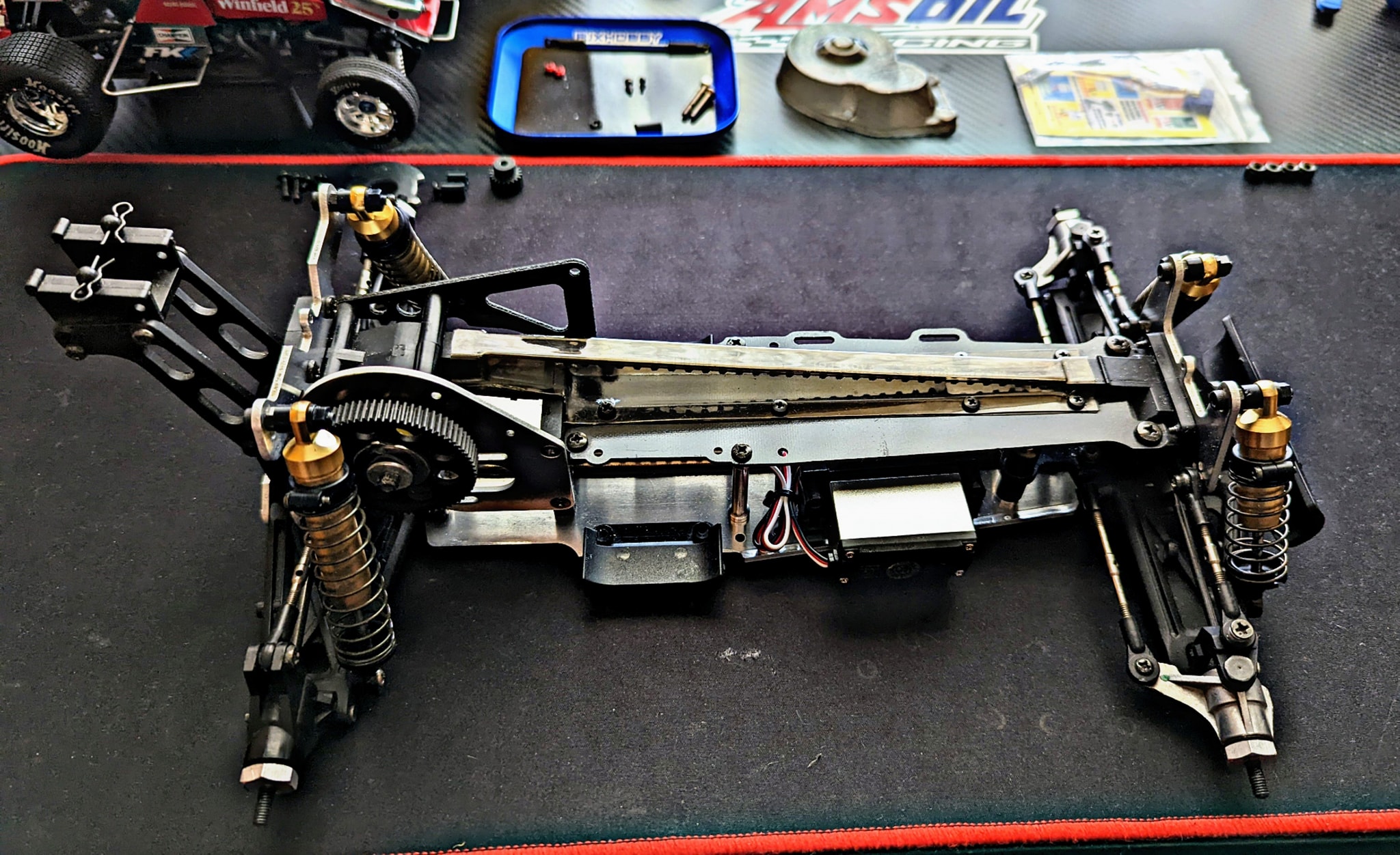 Vintage Kyosho Optima Mid Customer Special. It needs a new body