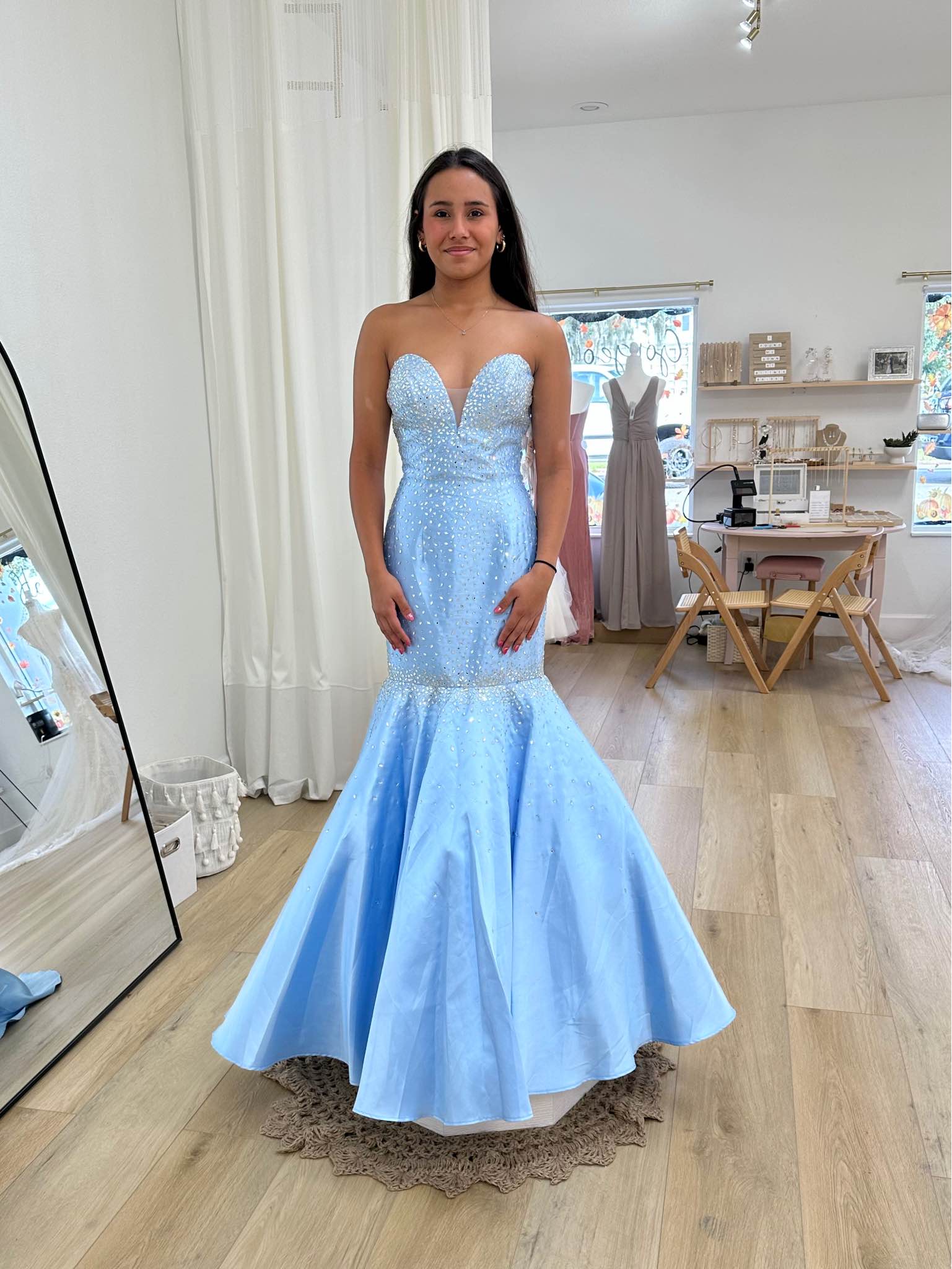 strapless dress with flowy bottom Stunning light blue formal dress. sweetheart neckline lots of sparkly rhinestones on the bodice and waist. Mermaid style with a bottom. Super pretty for prom or any fancy event! Prom dress