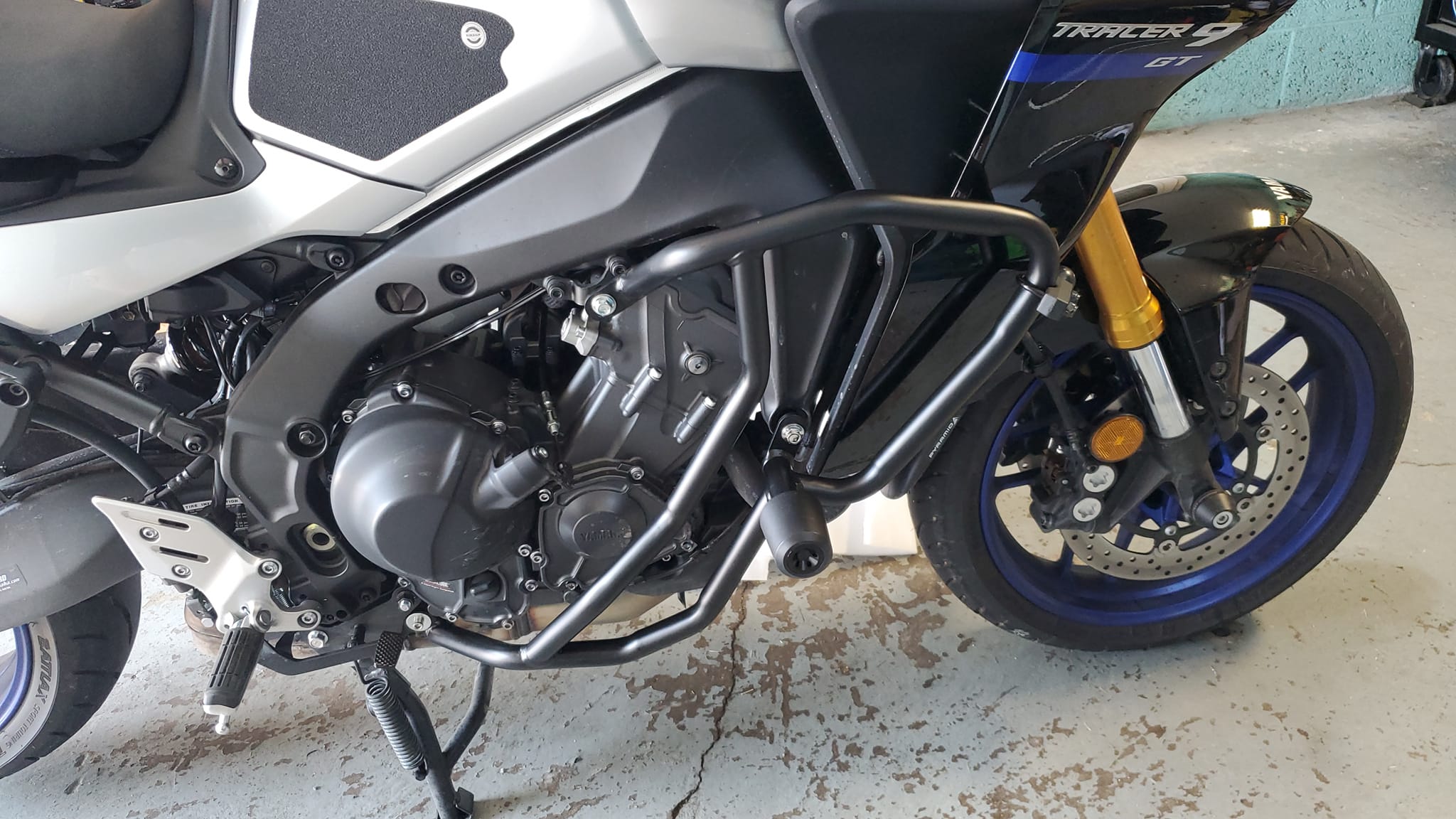 What are good bash guards and exhaust protections for Tracer 9 GT?