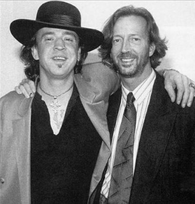 Eric Clapton and Stevie Ray Vaughan (hatless)